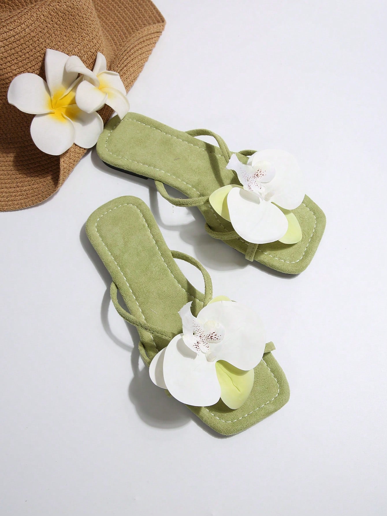 Women's open-toe flat slide sandals with a single strap and applique detail, glamorous casual style for beach and daily wear.