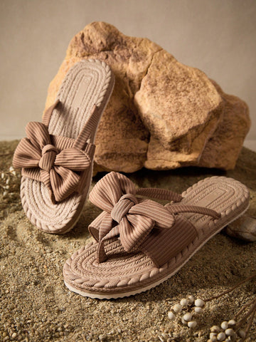 Women’s khaki flat slide sandals with bow decor and open toe design, lightweight non-slip sole, casual comfort style