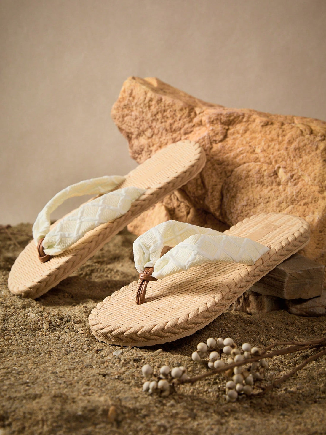 White women's flat sandals with cloud-inspired colorblock and tropical pattern, featuring braided woven-look straps and a casual beach style.