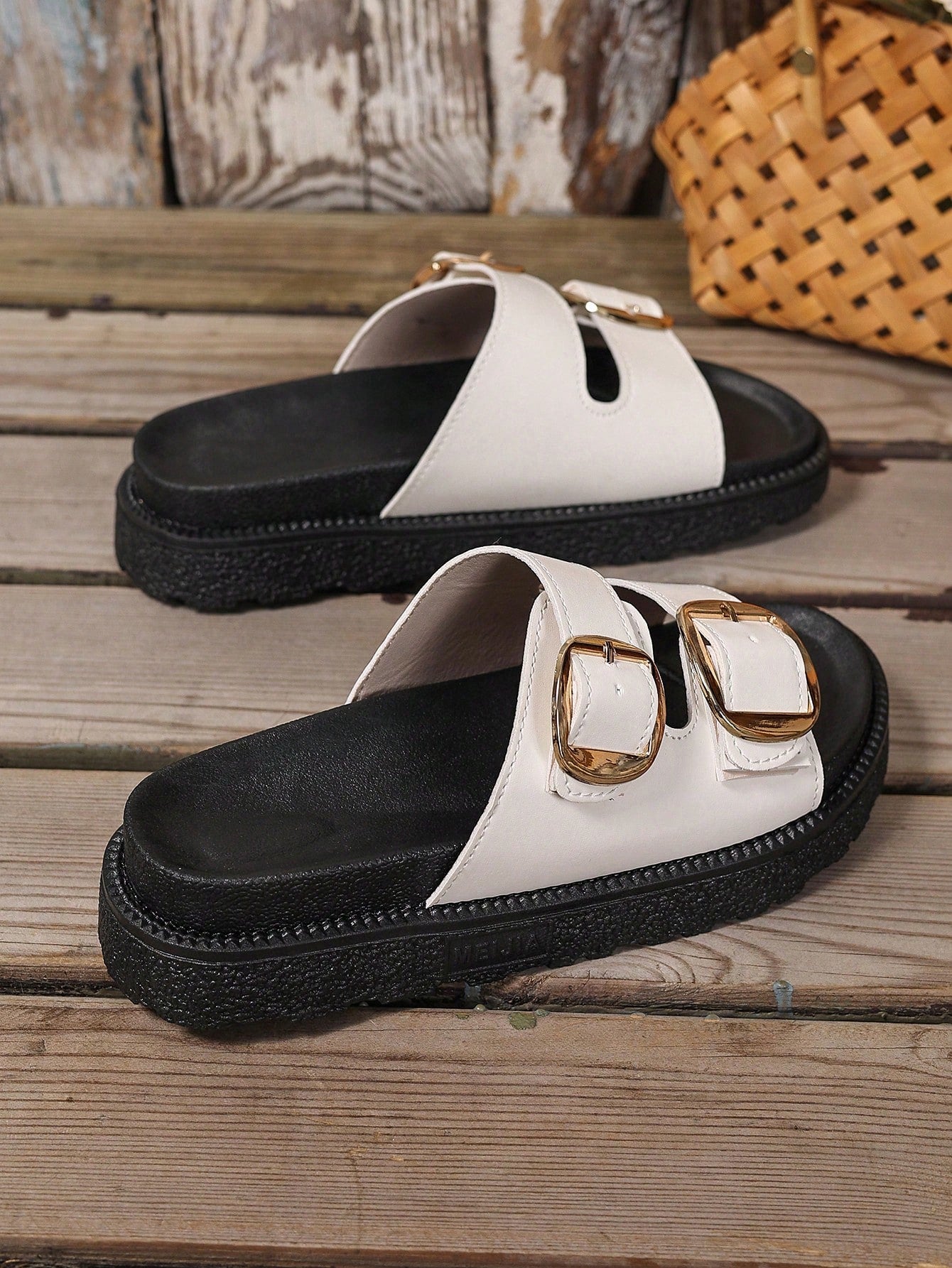 Plus size women's wedge platform slide sandals with open toe, buckle detail, and low heel slip-on design.