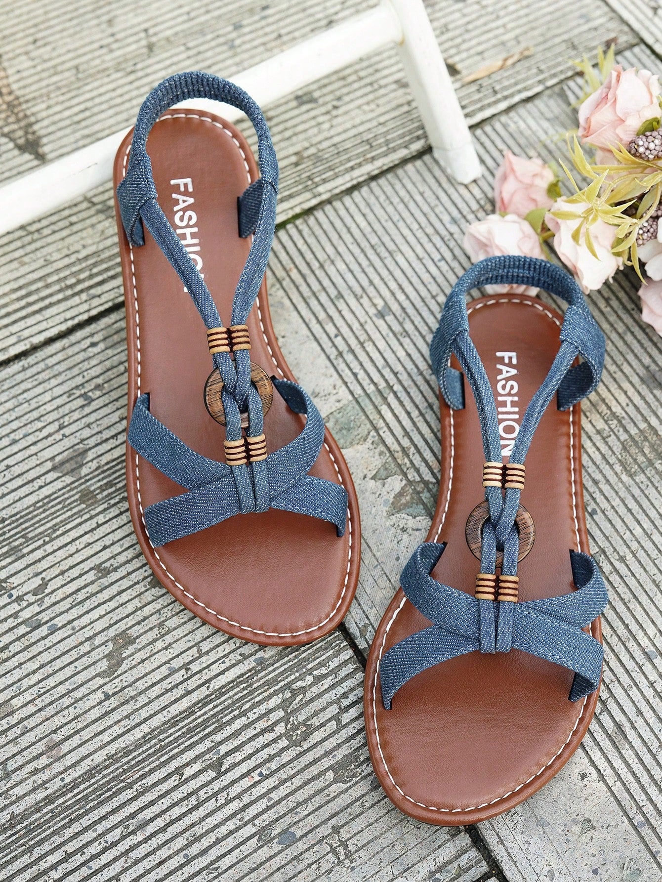 Women's beaded open-toe thong flat sandals in slip-on style for outdoor and beach casual wear.