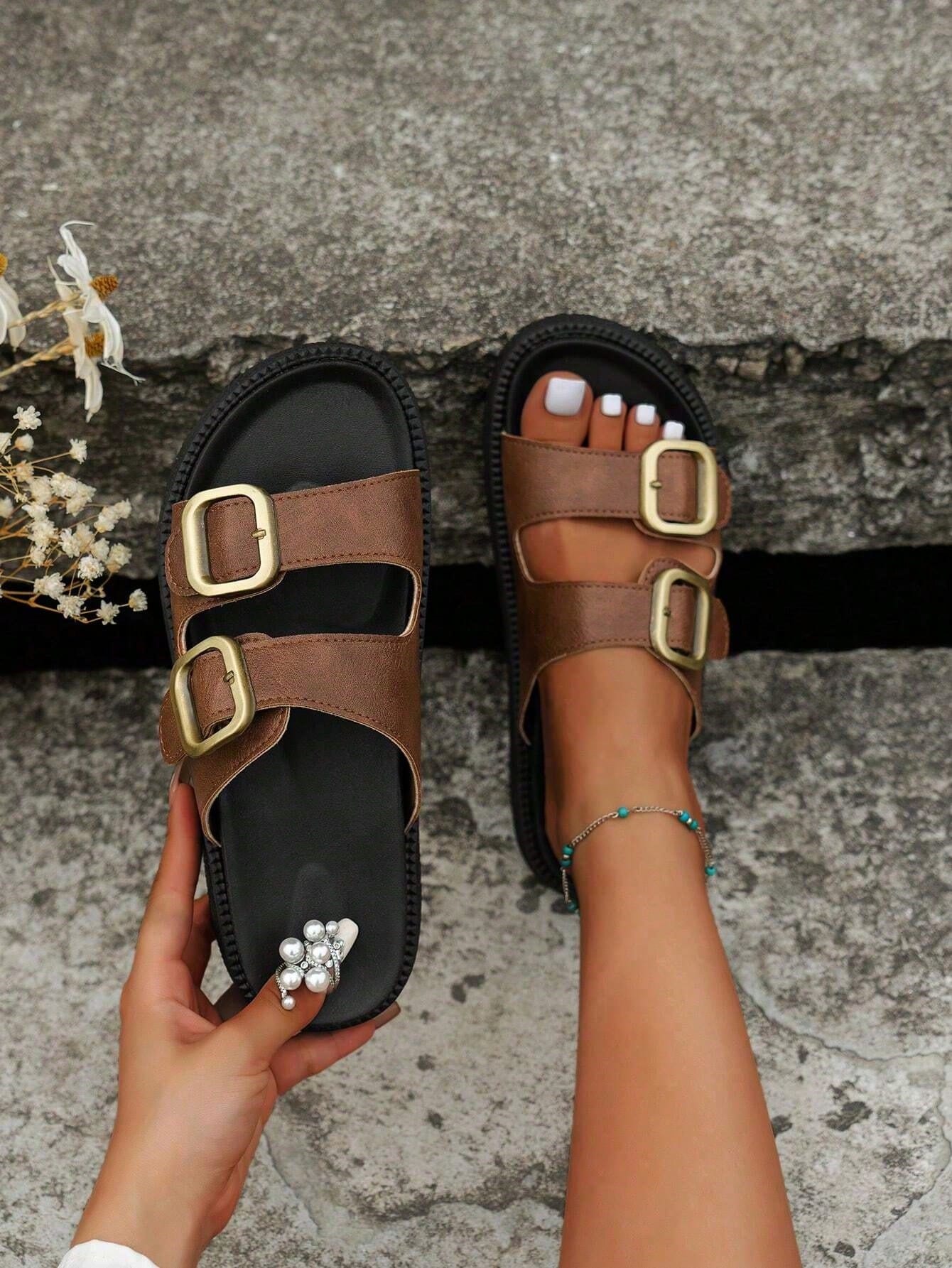 Plus size women's wedge platform slide sandals with open toe, buckle detail, and low heel slip-on design.
