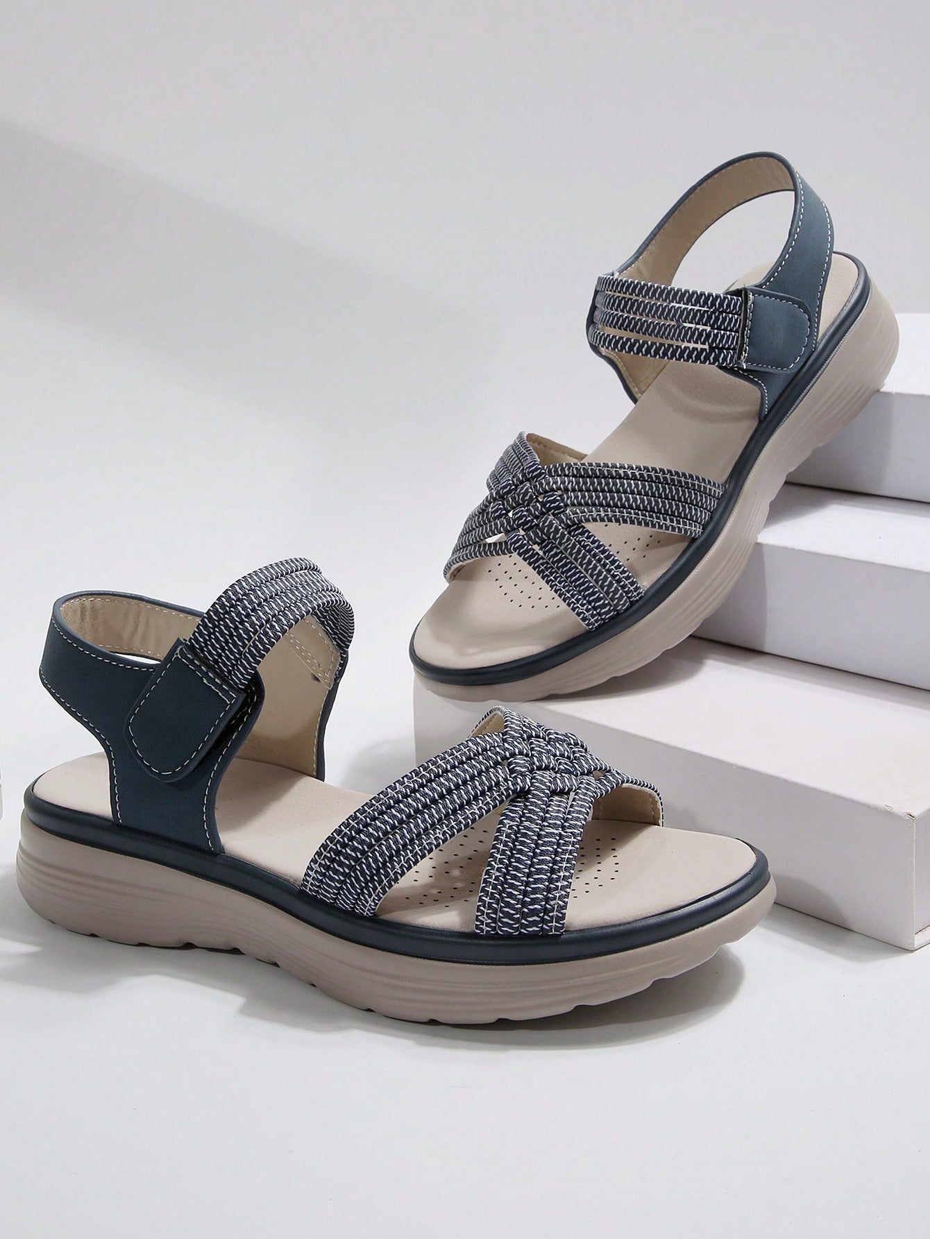 Women's plus size platform wedge sandals with hook-and-loop closure, open toe, ankle strap, and cut-out detailing in a casual beach style.