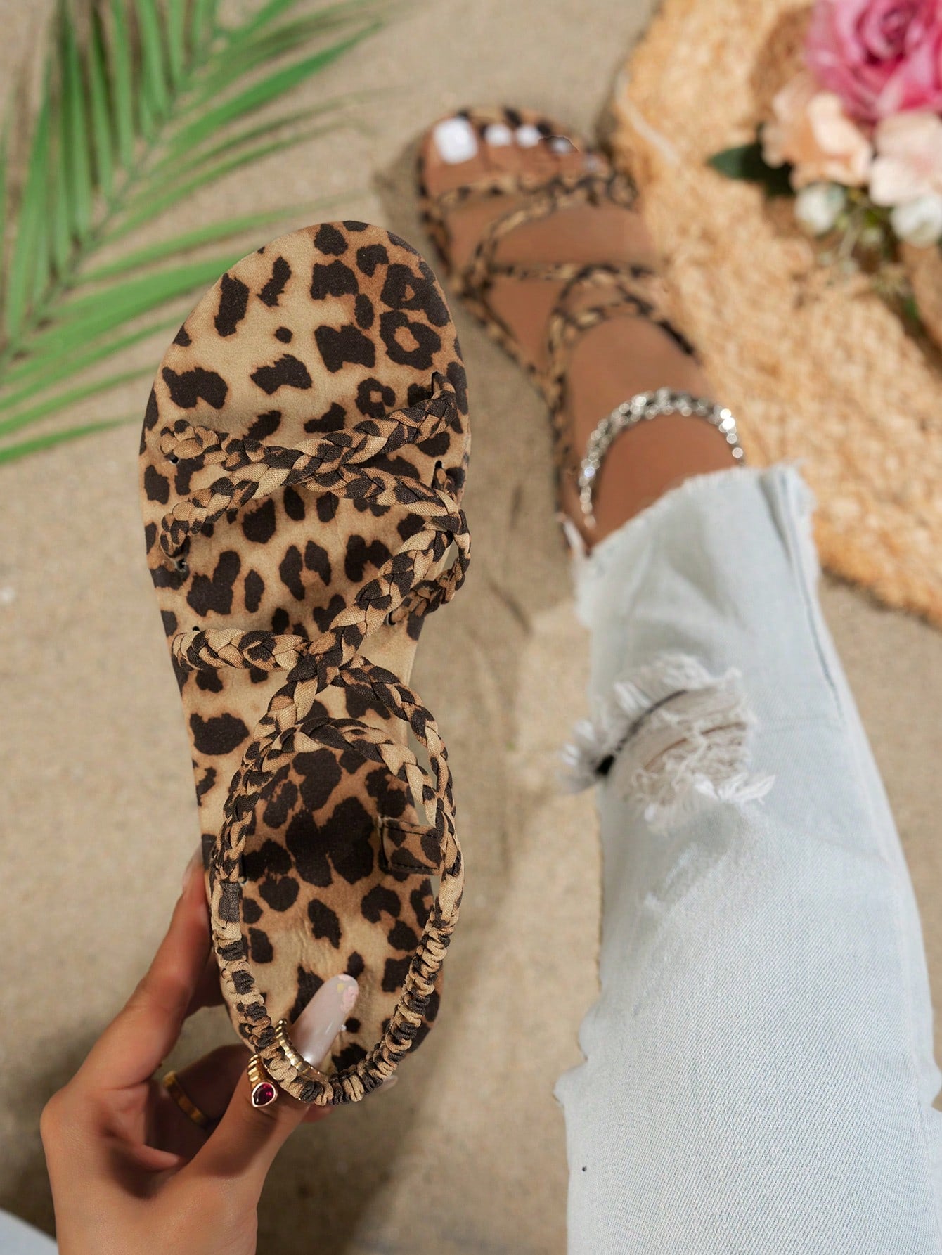 Women’s leopard print woven flat slide sandals with cut-out details and open toe silhouette, casual beach-style slip-on design.