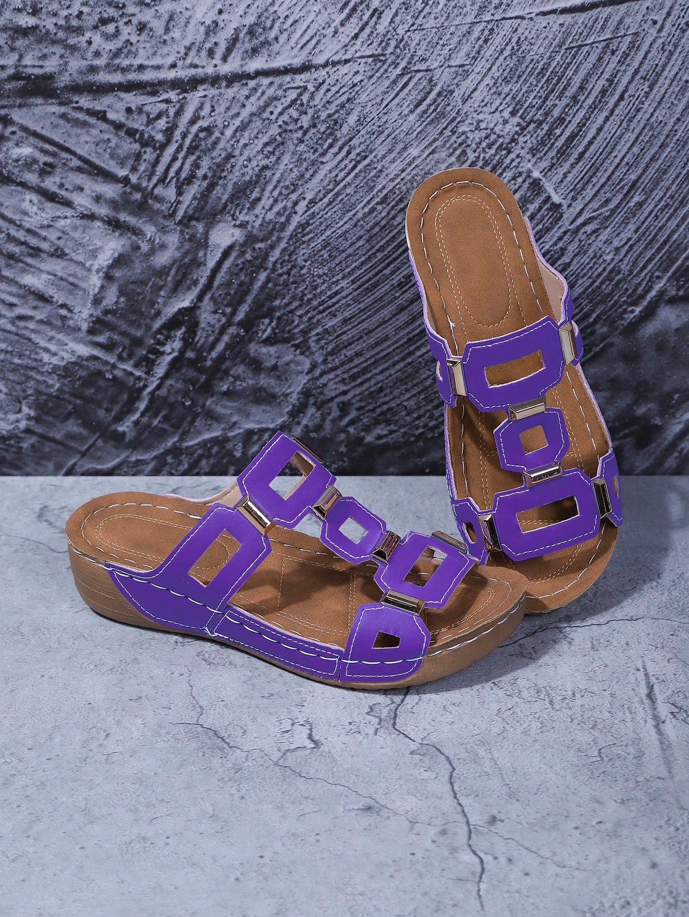 Women's open-toe wedge slide sandals with studded hollow-out upper, cross-over straps, buckle closure, and thick soft sole