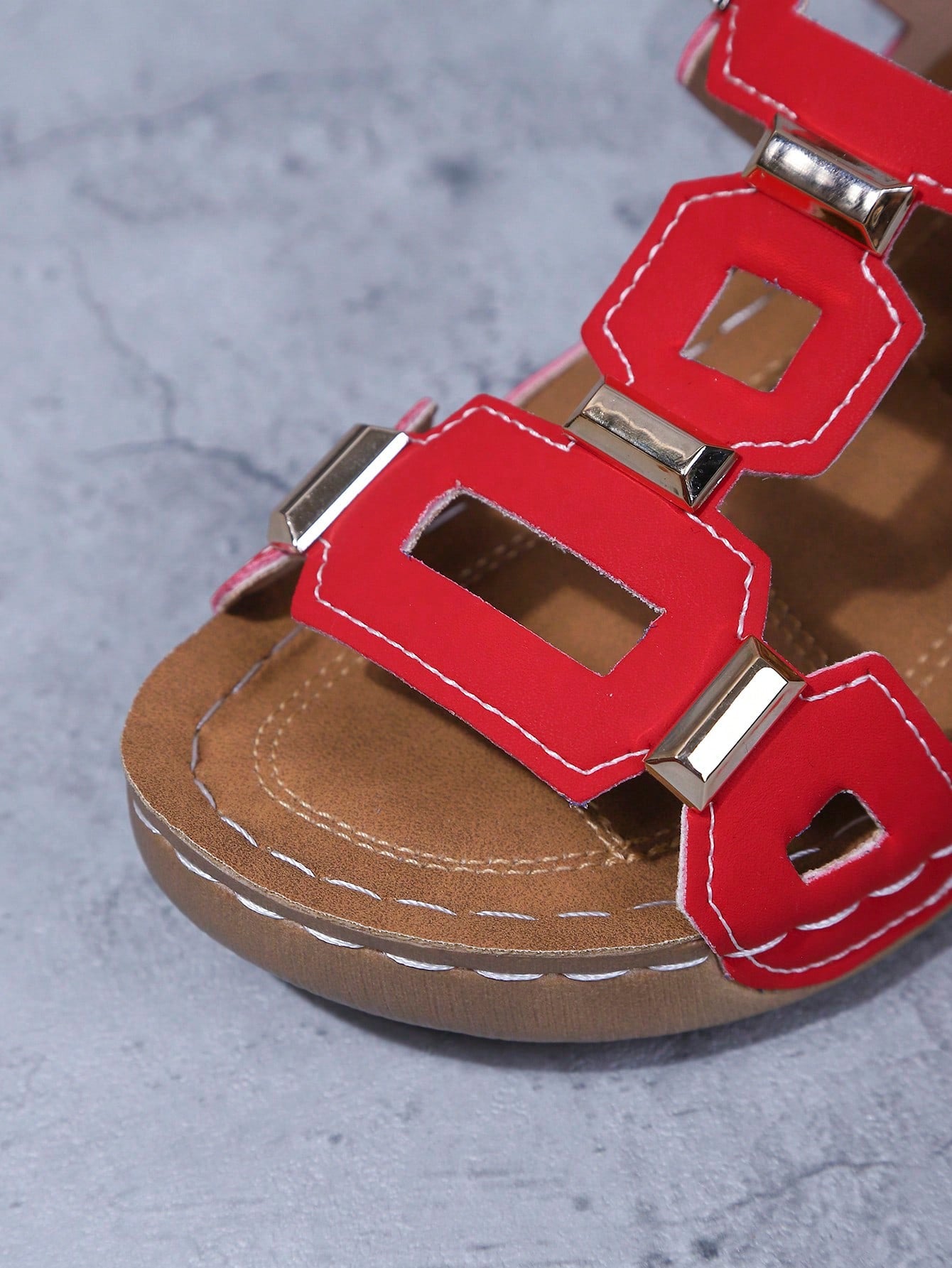 Women's open-toe wedge slide sandals with studded hollow-out upper, cross-over straps, buckle closure, and thick soft sole