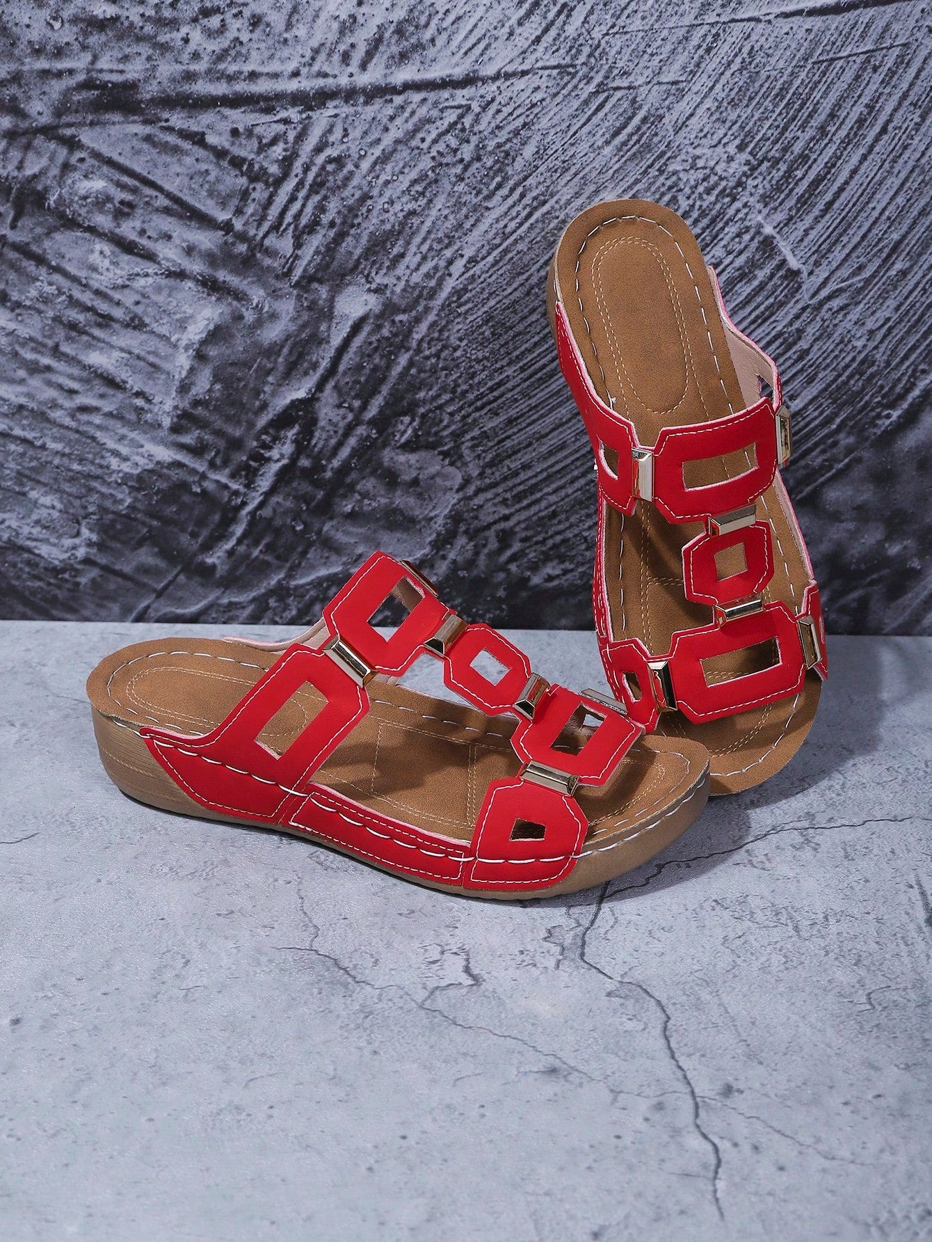 Women's open-toe wedge slide sandals with studded hollow-out upper, cross-over straps, buckle closure, and thick soft sole