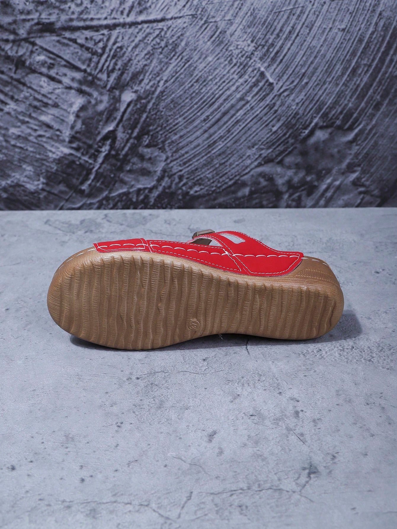 Women's open-toe wedge slide sandals with studded hollow-out upper, cross-over straps, buckle closure, and thick soft sole