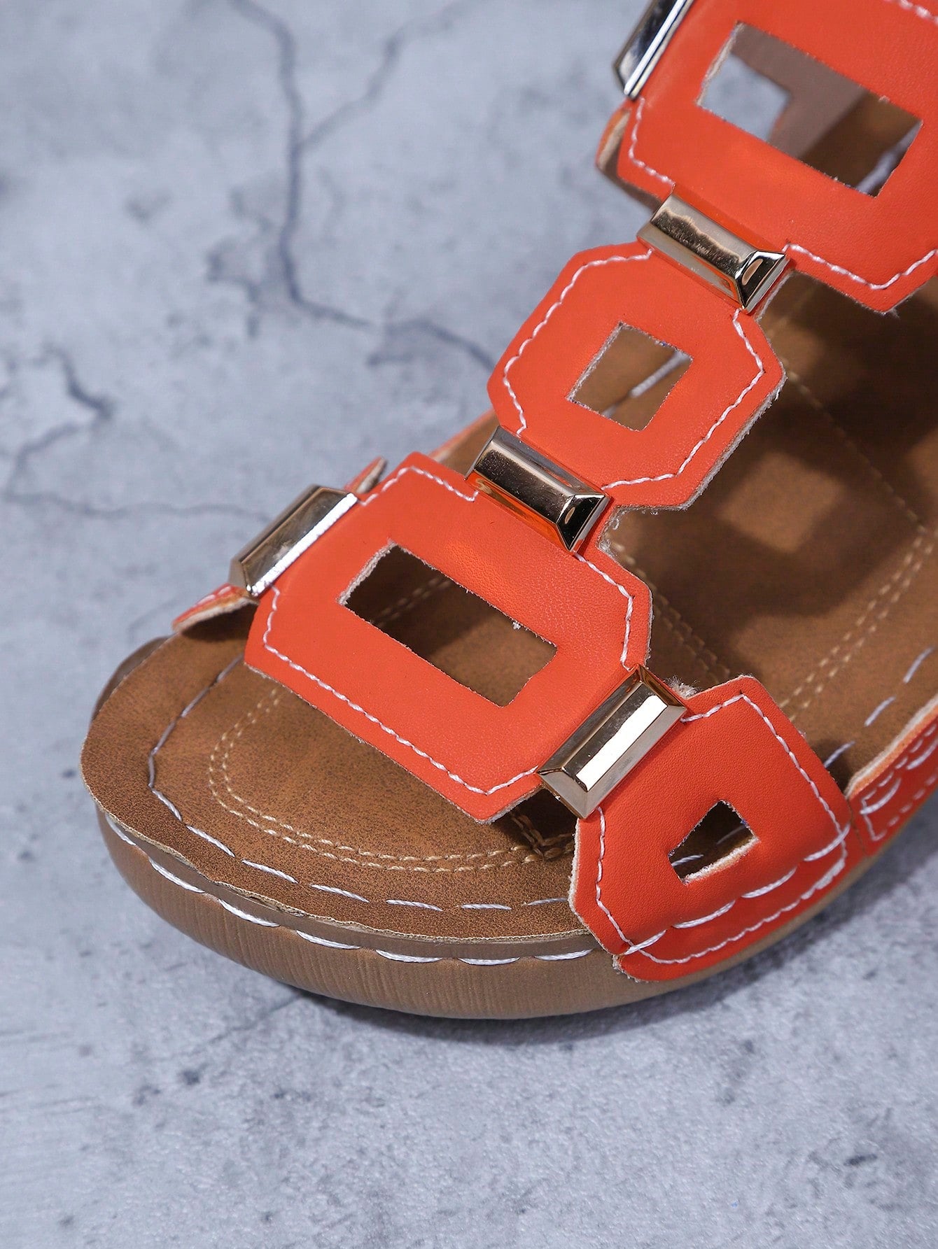 Women's open-toe wedge slide sandals with studded hollow-out upper, cross-over straps, buckle closure, and thick soft sole