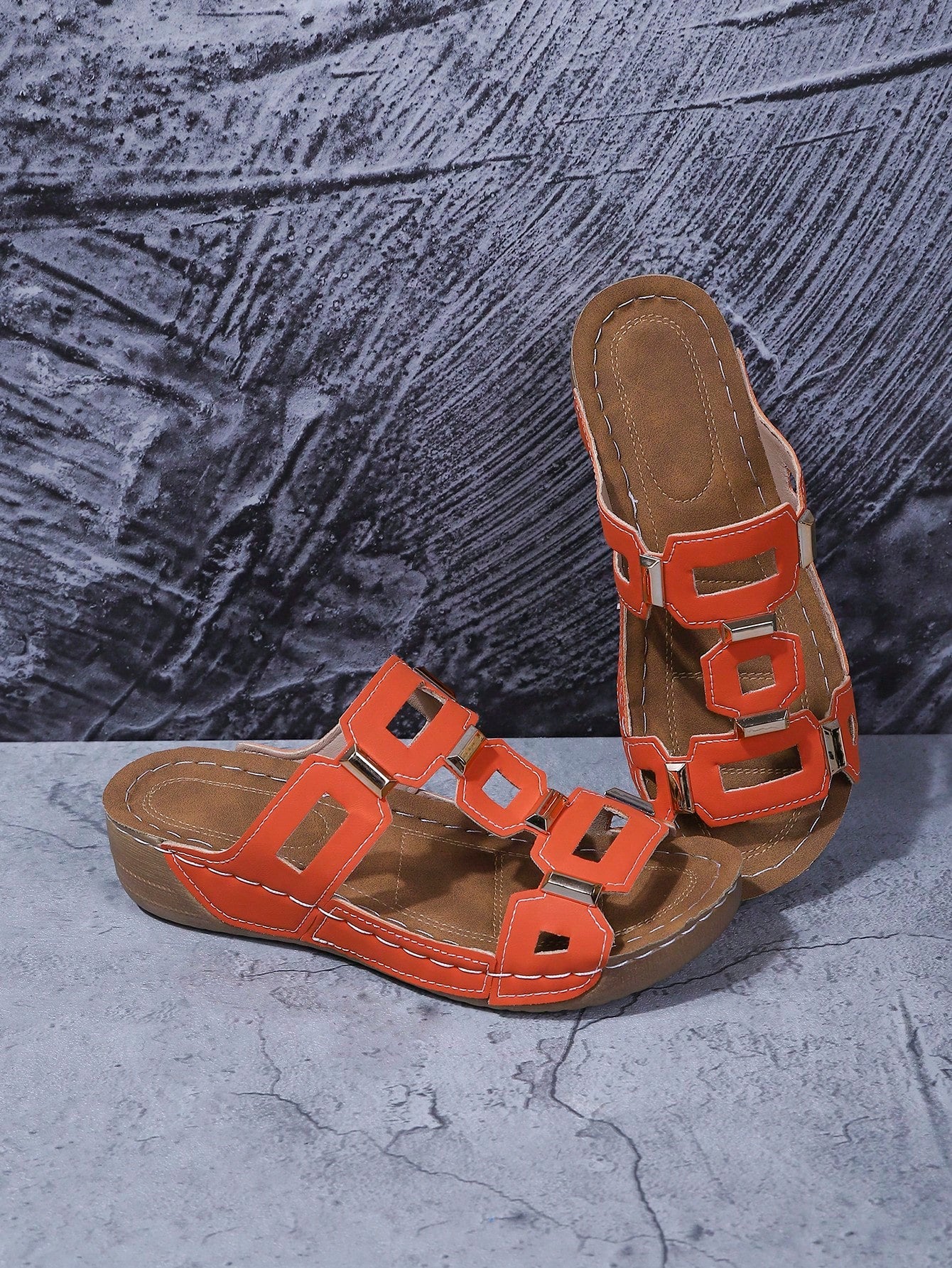 Women's open-toe wedge slide sandals with studded hollow-out upper, cross-over straps, buckle closure, and thick soft sole