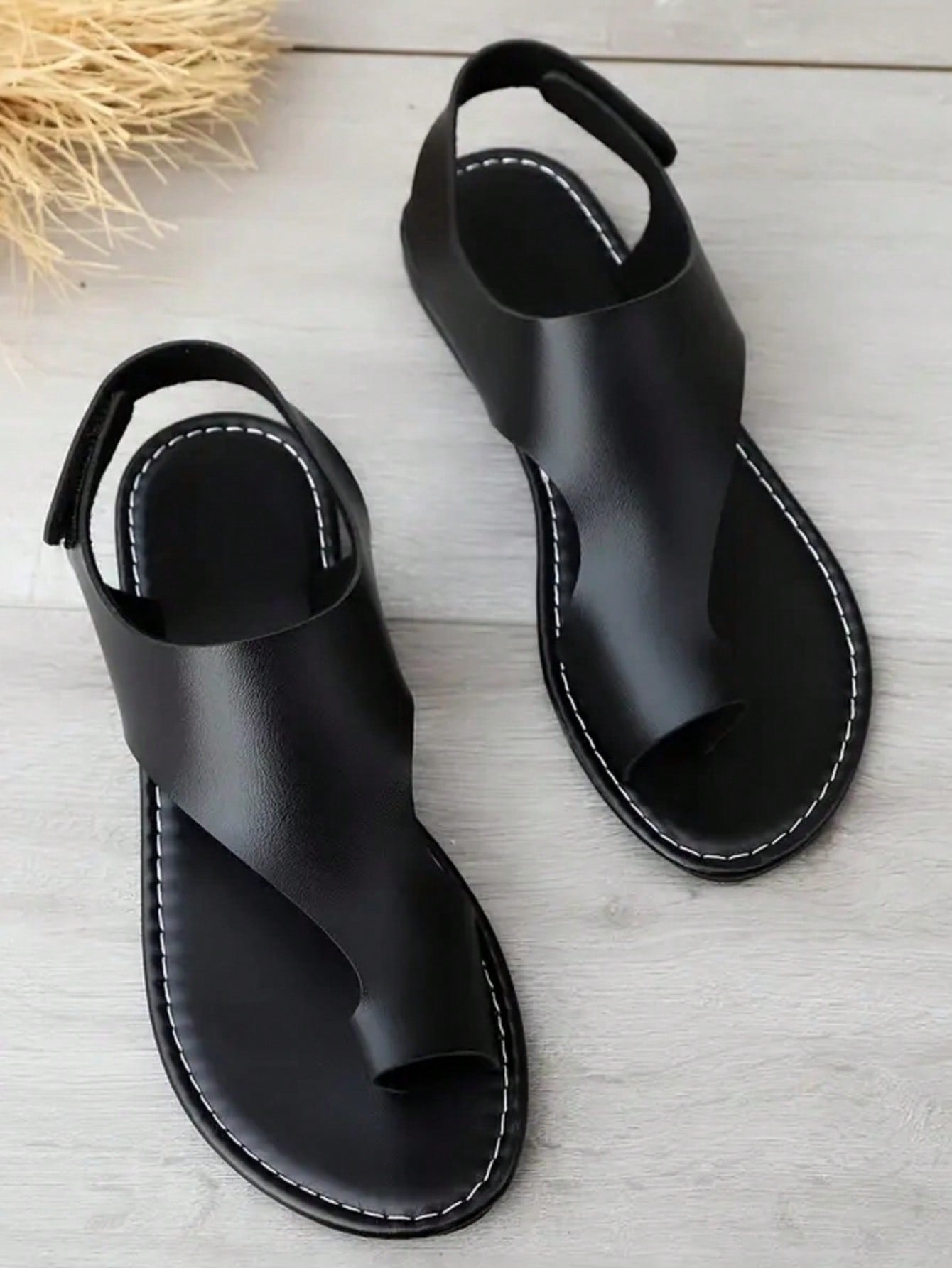 Women's flat slide sandals with toe ring toe-post design and hook-and-loop detail, suitable for summer outdoor wear.