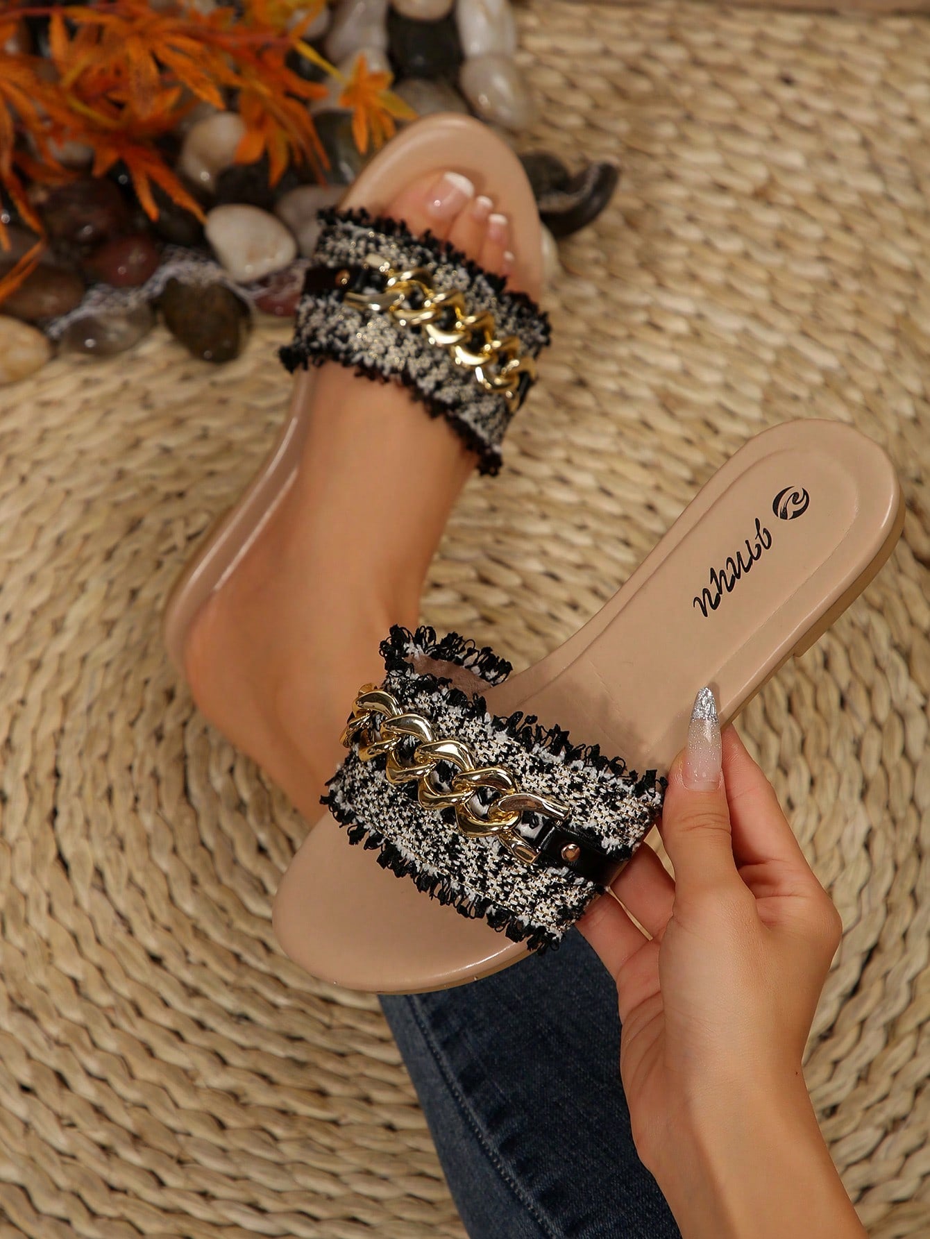 Women's flat open-toe slide sandals featuring pearl chain and rhinestone decor in a beach style.