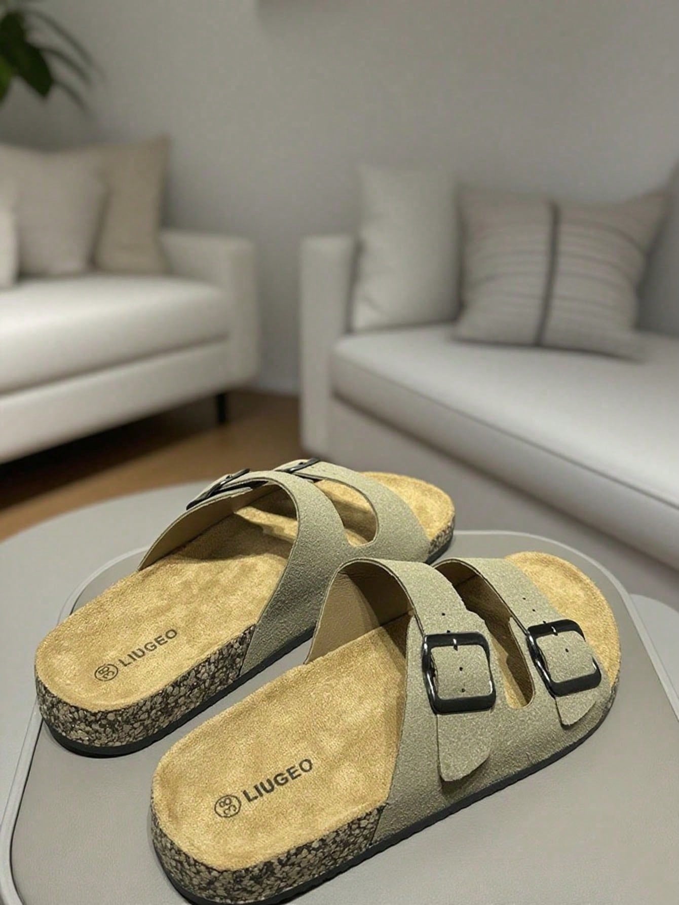 Open-toe footbed slip-on mule sandals with buckle detail and cork-style sole, flat heel design for casual summer home and outdoor walking.