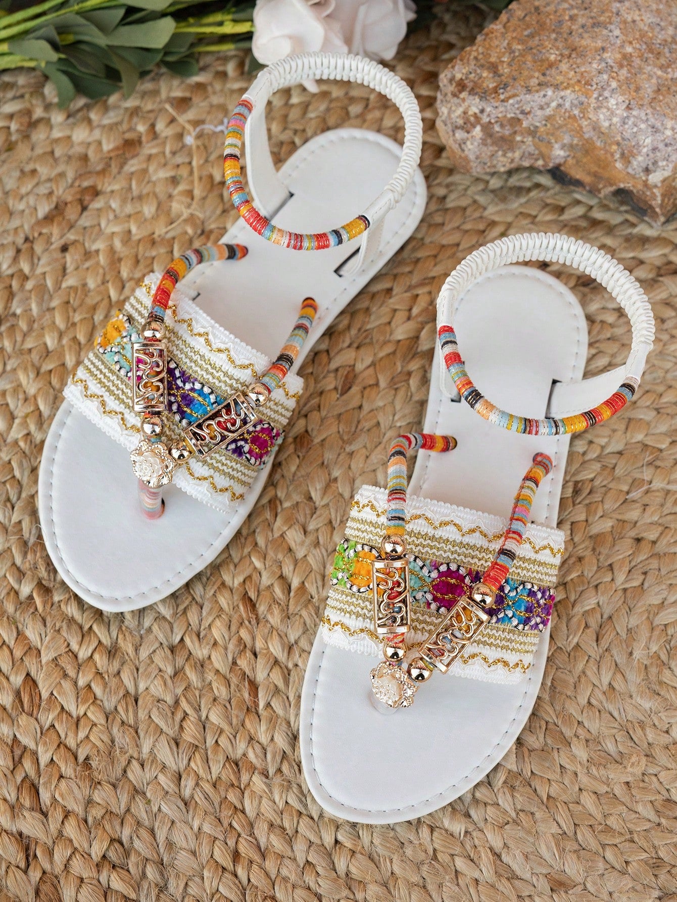 Women's bohemian flat slingback sandals with beaded detailing and open-toe design, featuring a fabric upper, PU leather lining and insole, and TPR outsole.