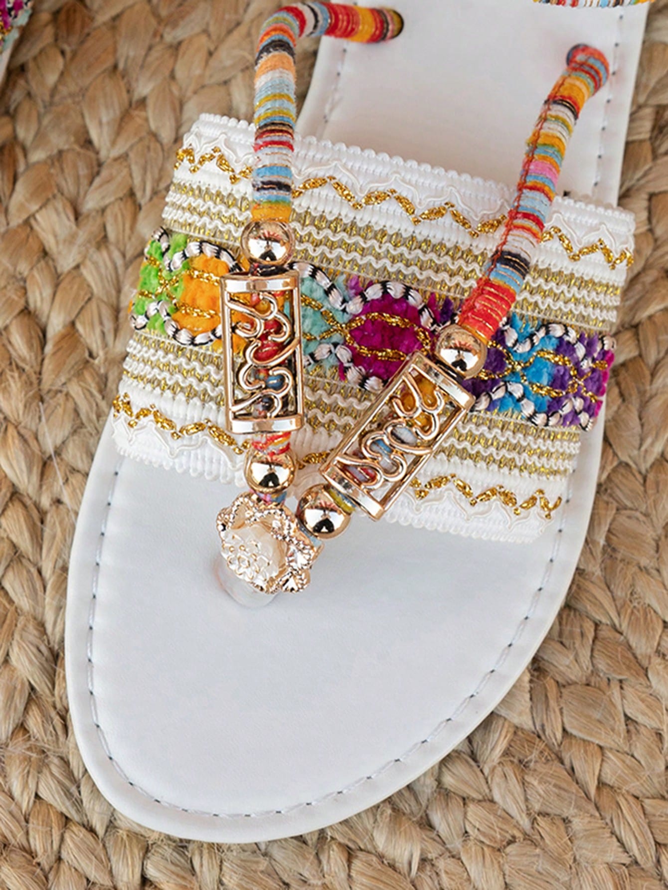 Women's bohemian flat slingback sandals with beaded detailing and open-toe design, featuring a fabric upper, PU leather lining and insole, and TPR outsole.
