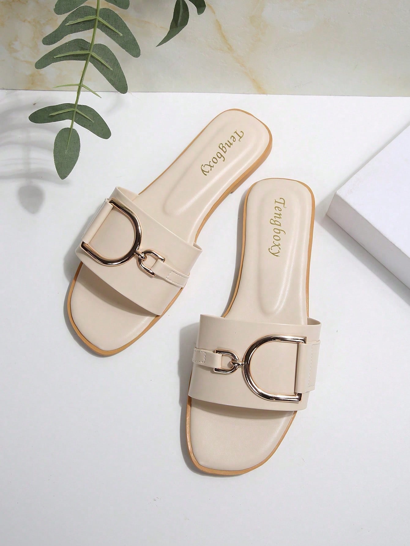 Women's chic flat sandals with ankle strap, cut-out design, colorblock pattern, and open toe, suitable for casual streetwear and beach wear.