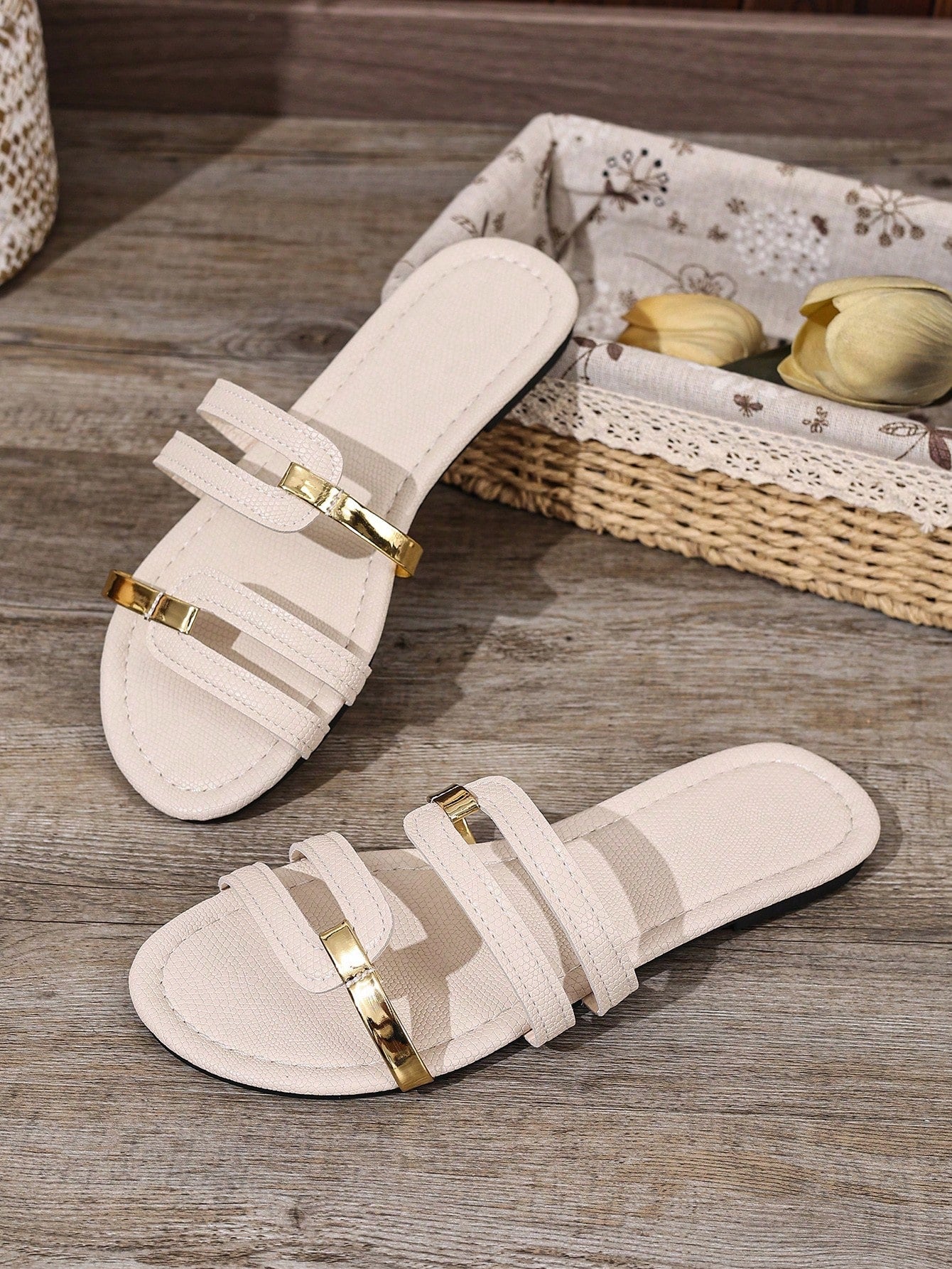 Women's yellow open-toe flat slide sandals featuring a cut-out design and textured plain pattern for casual beach and daily wear.