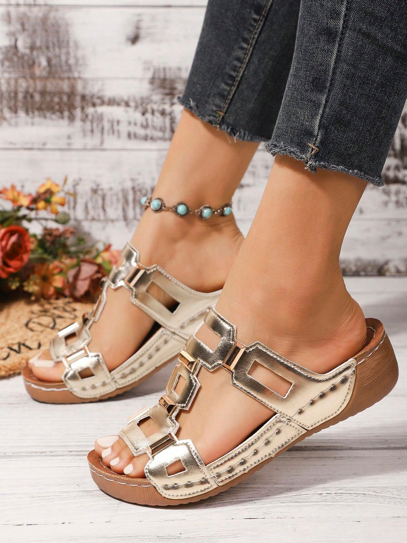 Women's open-toe wedge slide sandals with studded hollow-out upper, cross-over straps, buckle closure, and thick soft sole