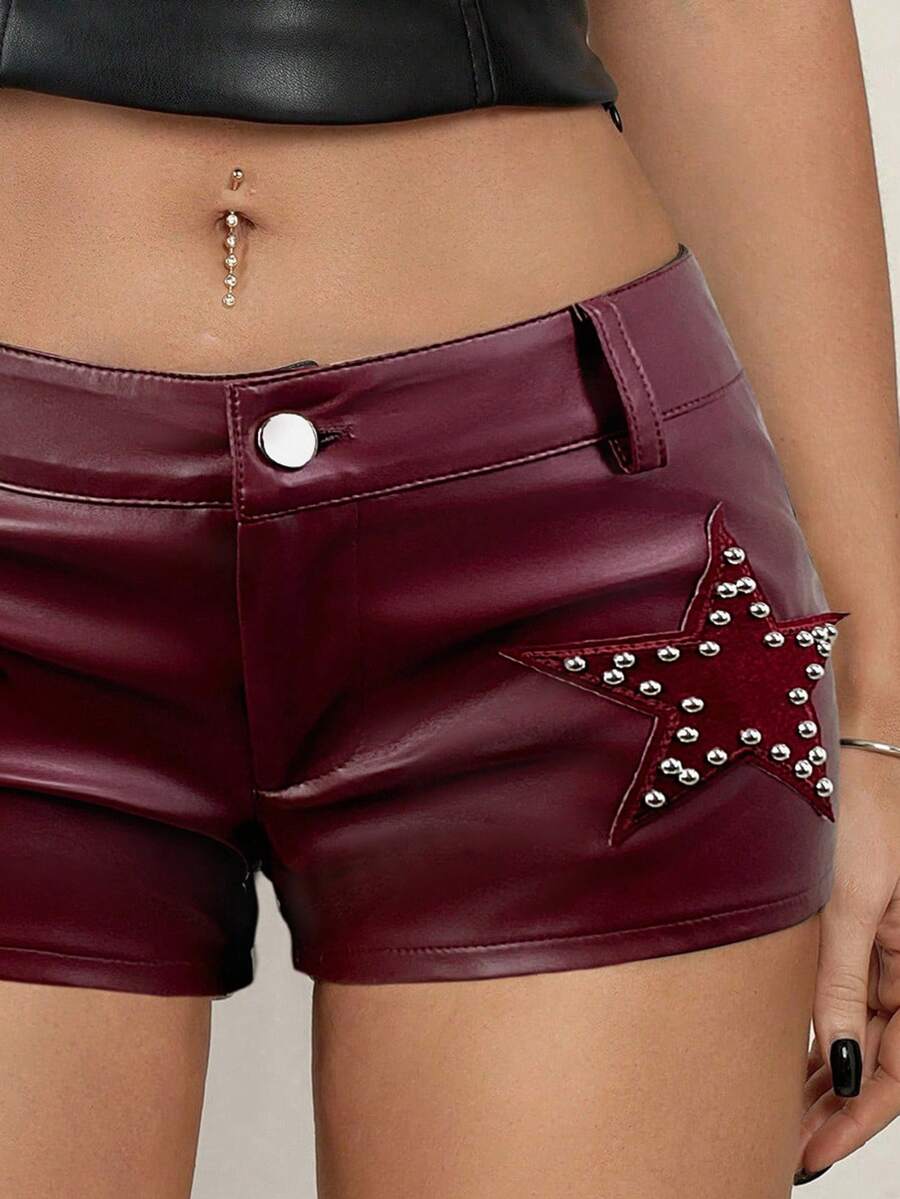 Women's Y2K low rise PU leather hot pants with star rivet details, zipper fly, button closure, and mini skinny fit