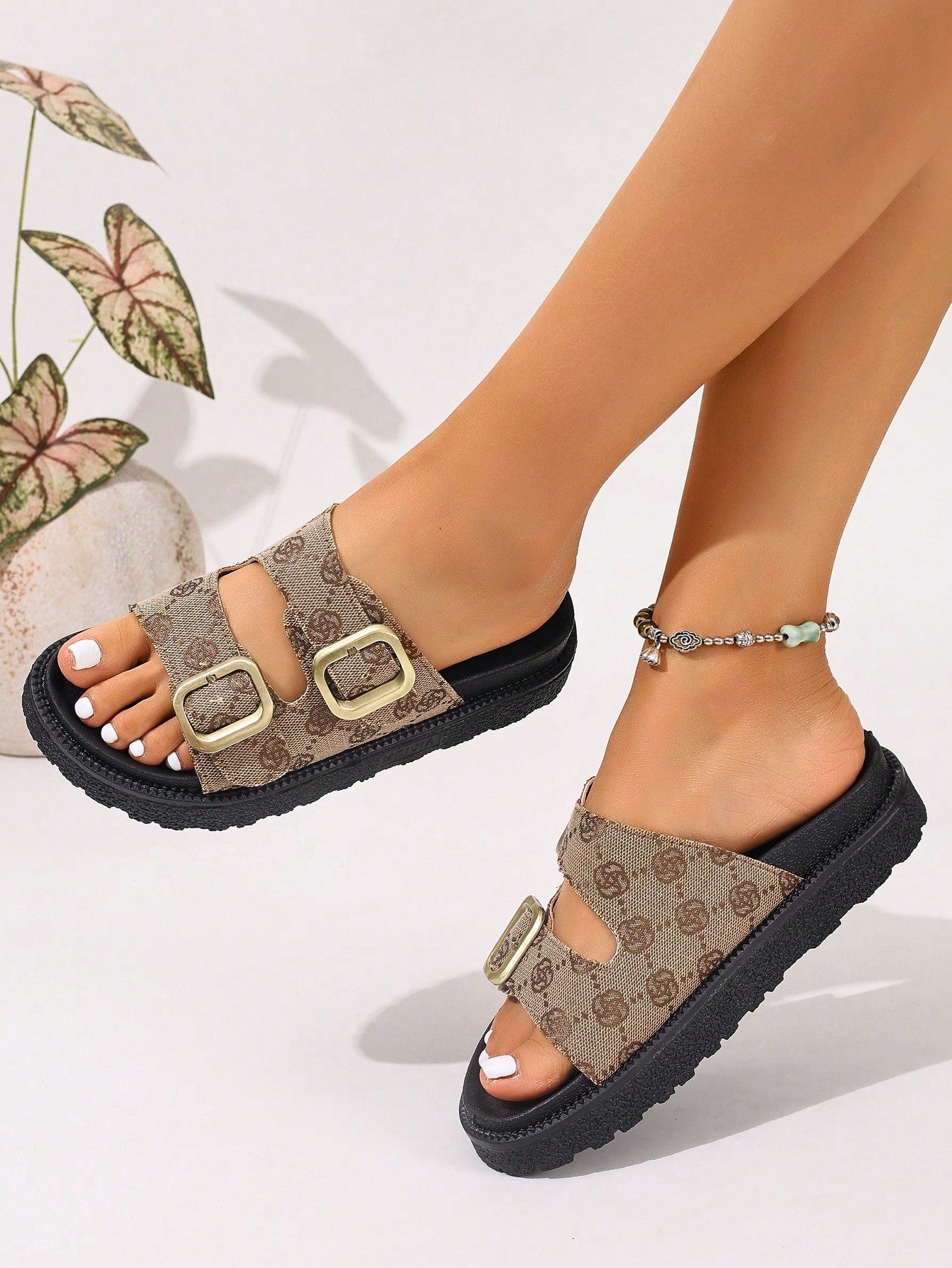 Plus size women's wedge platform slide sandals with open toe, buckle detail, and low heel slip-on design.