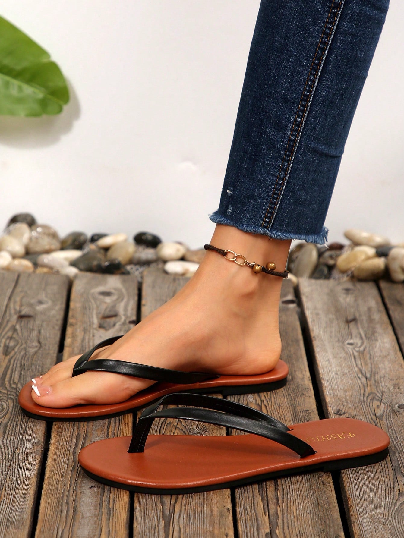 Women's chocolate brown flat flip flop sandals featuring a toe-post thong style and braided detail, suitable for casual indoor and outdoor wear.