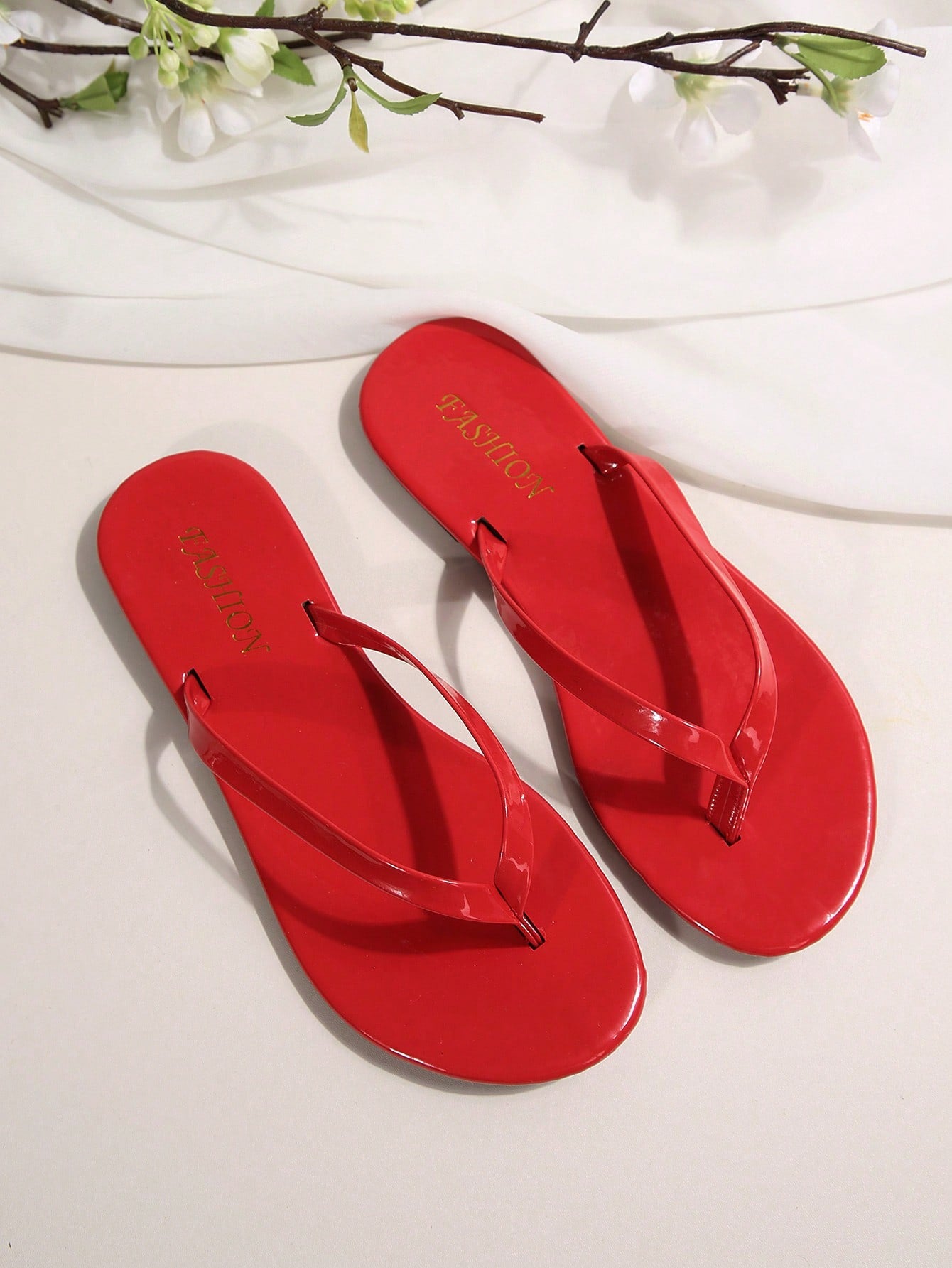 Women's chocolate brown flat flip flop sandals featuring a toe-post thong style and braided detail, suitable for casual indoor and outdoor wear.