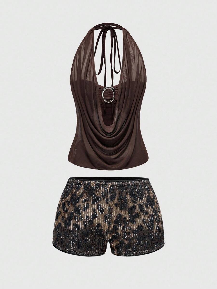 Women's two-piece outfit with a sleeveless halter cowl neck backless crop camisole, tie-back detail, bandeau inner, and leopard print shorts.