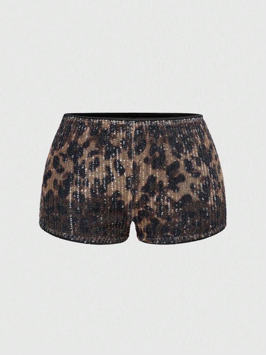 Women's two-piece outfit with a sleeveless halter cowl neck backless crop camisole, tie-back detail, bandeau inner, and leopard print shorts.