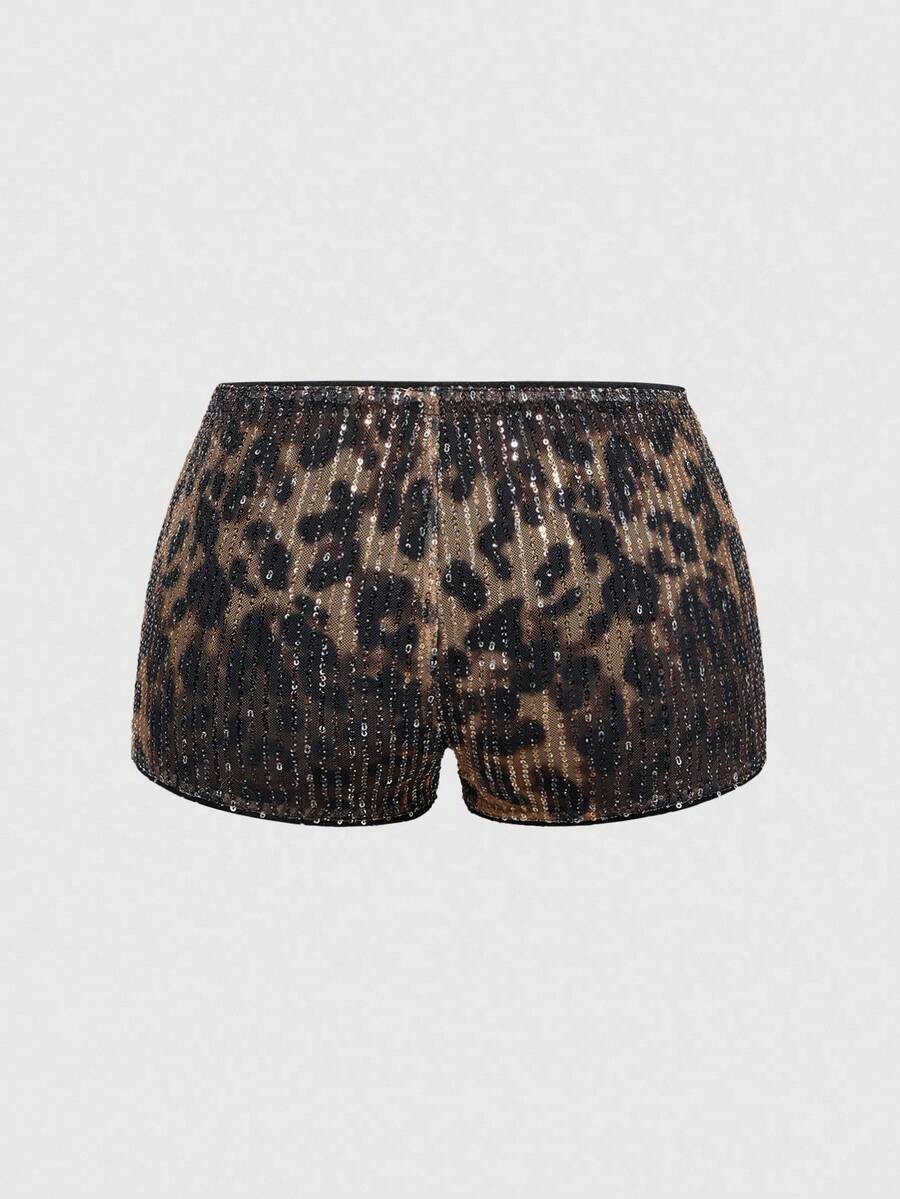 Women's two-piece outfit with a sleeveless halter cowl neck backless crop camisole, tie-back detail, bandeau inner, and leopard print shorts.