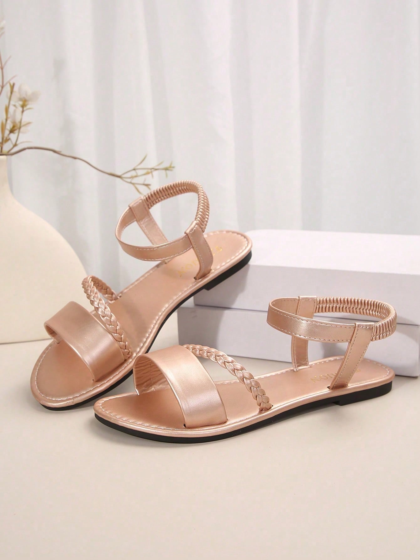 Women's plus size flat slide sandals with woven braid detail, open toe design, and elastic band strap, suitable for casual outdoor, beach, and vacation wear.