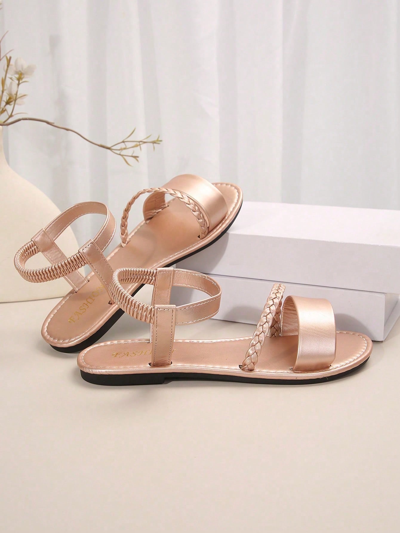Women's plus size flat slide sandals with woven braid detail, open toe design, and elastic band strap, suitable for casual outdoor, beach, and vacation wear.