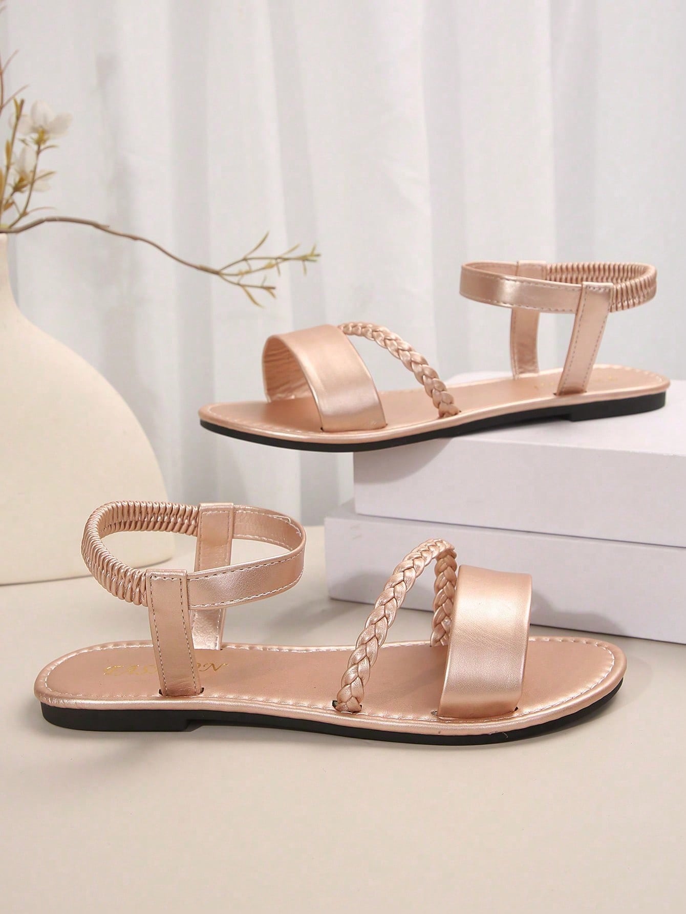 Women's plus size flat slide sandals with woven braid detail, open toe design, and elastic band strap, suitable for casual outdoor, beach, and vacation wear.