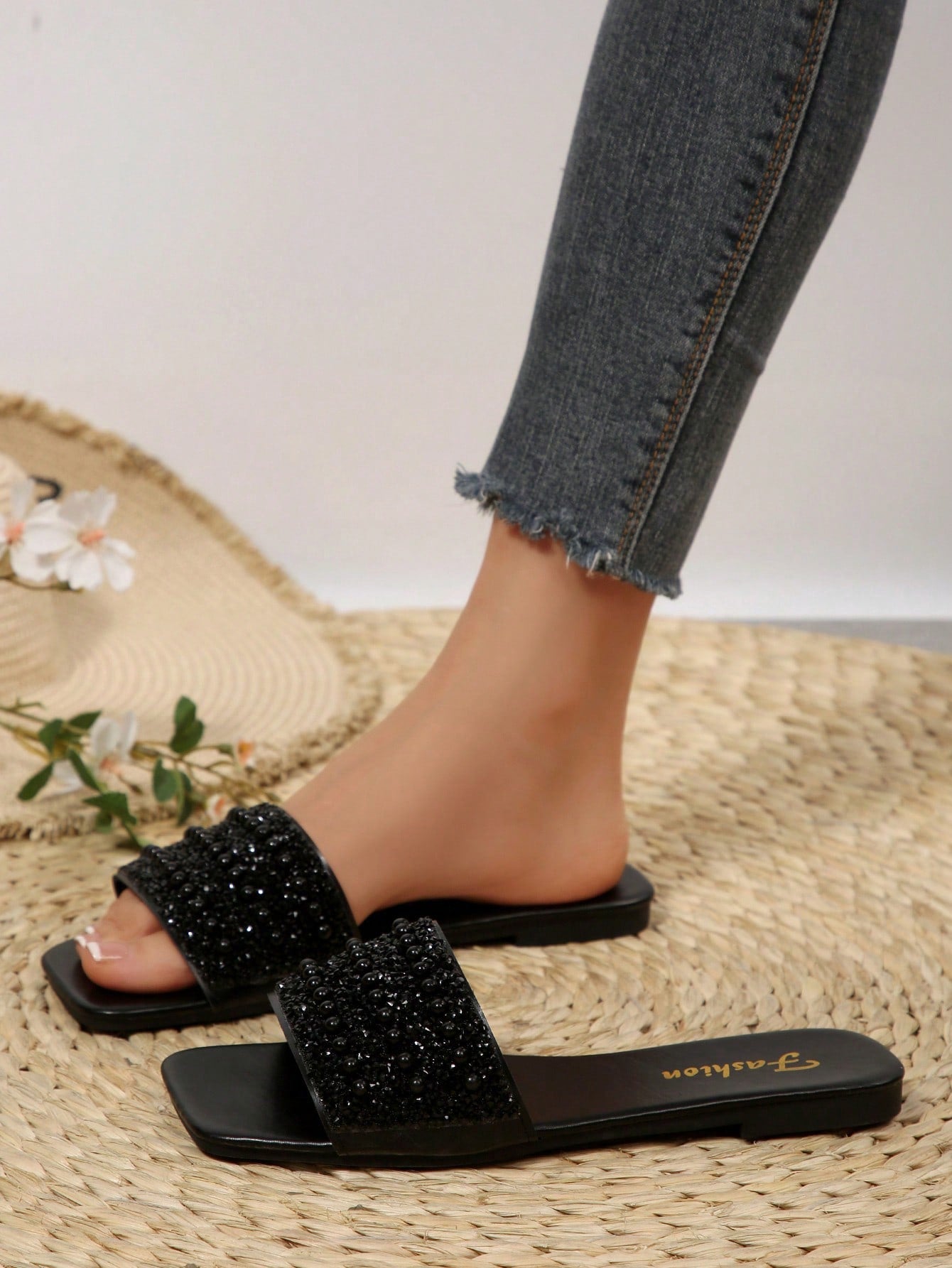 Women's flat slide sandals with rhinestone-decorated straps and open toe, casual outdoor style with plain design.