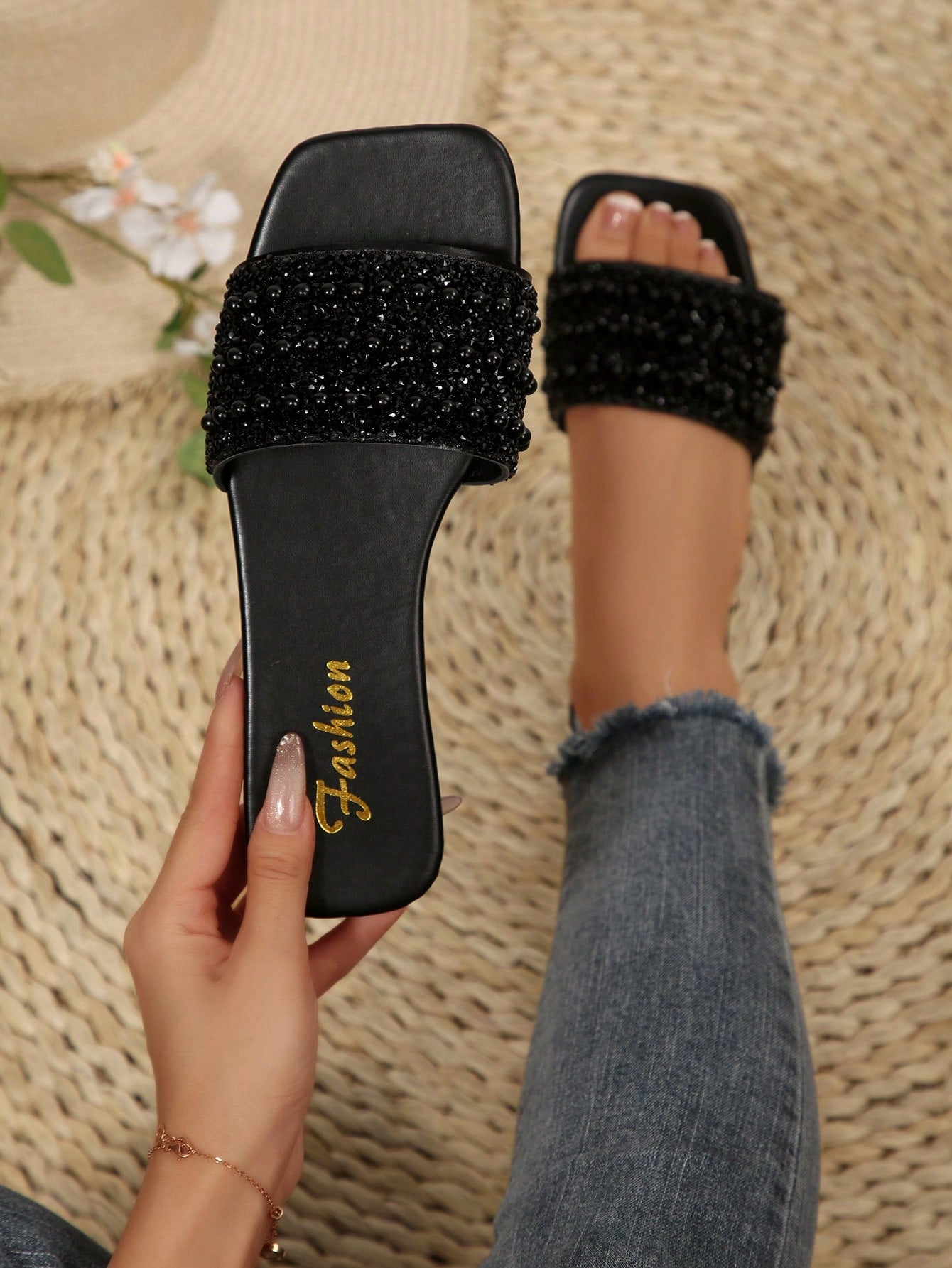 Women's flat slide sandals with rhinestone-decorated straps and open toe, casual outdoor style with plain design.