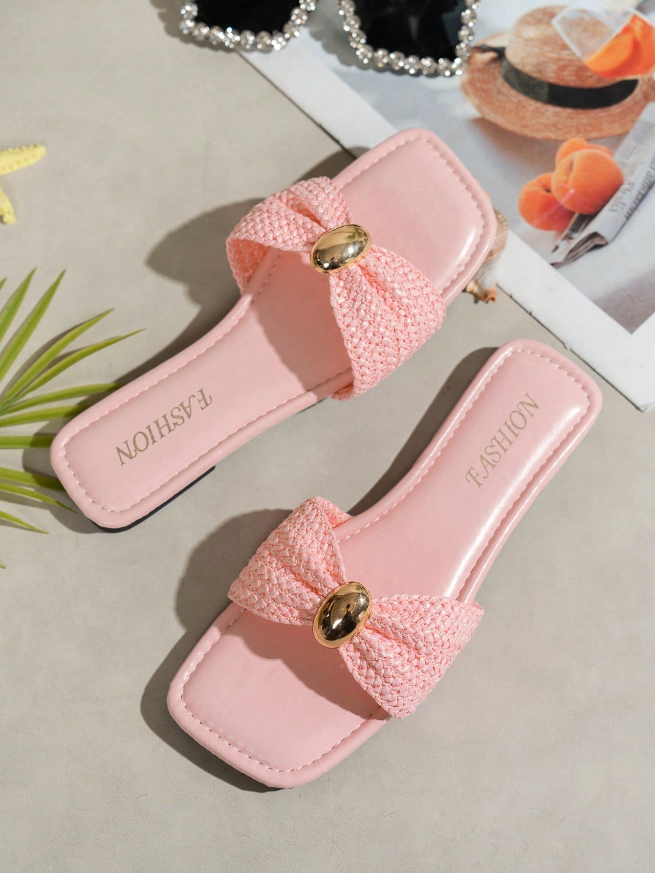 Women's ginger woven flat slide sandals with open toe, bow knot detail, and metal decor in a minimalist beach style.