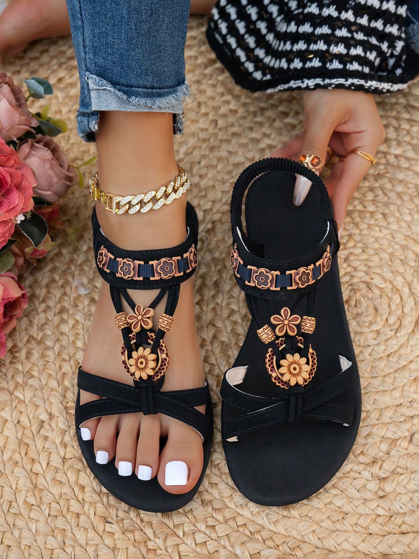 Women's flat slip-on sandals with open toe, plain solid-color look, beaded detail, and golden bar decor in a classic bohemian-inspired style.