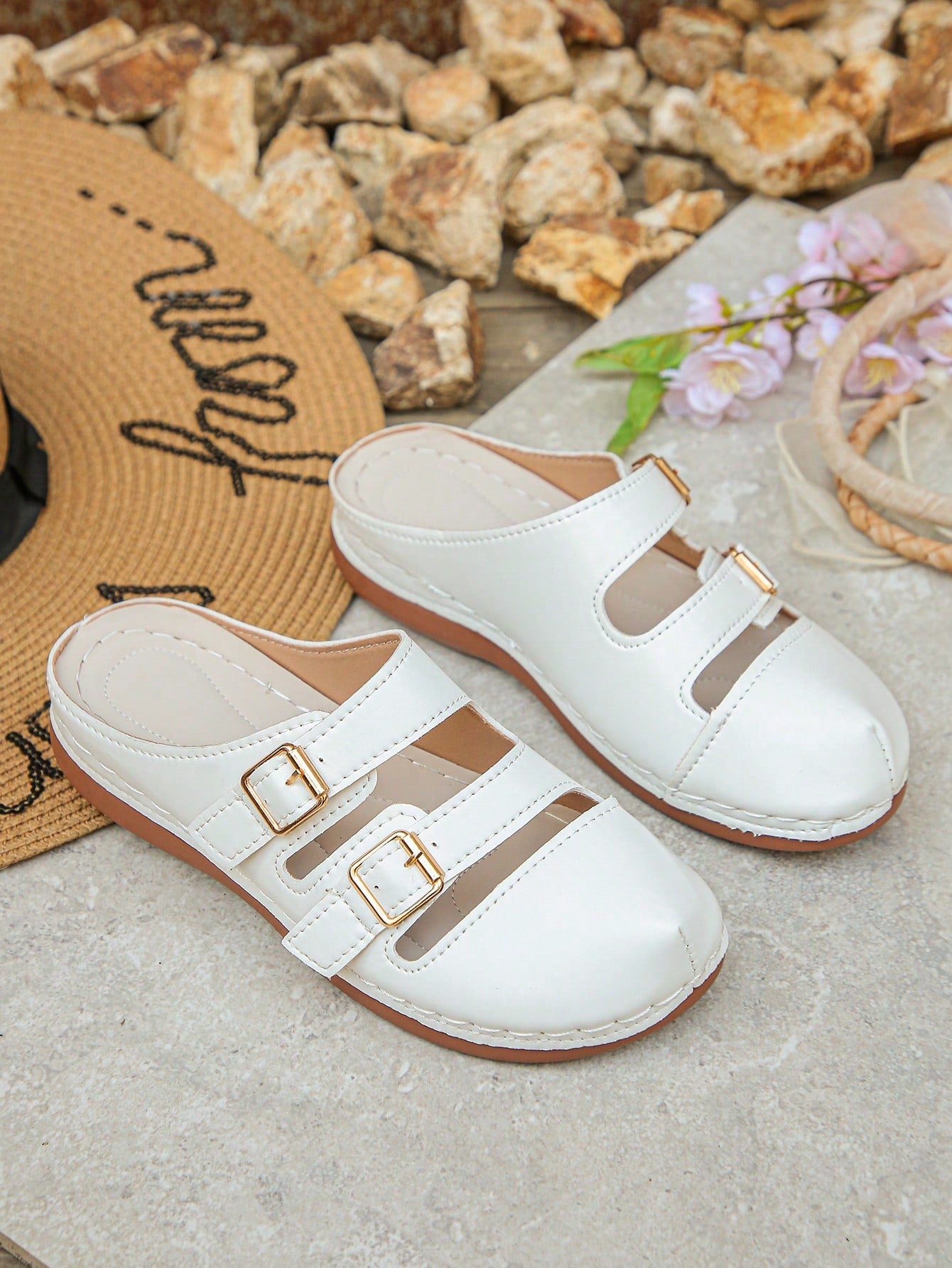 Women's bohemian wedge slide sandals with open toe, low wedge heel, slip-on design, and metal detail, available in plus sizes 36-43.