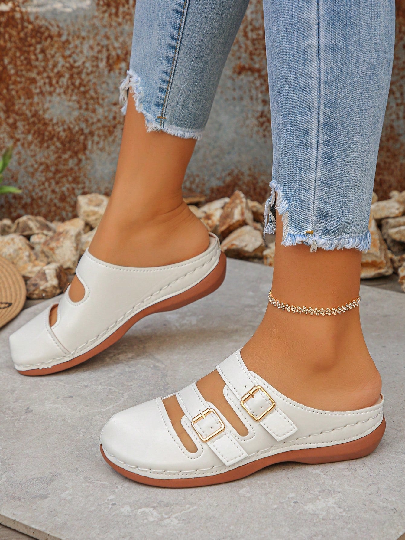 Women's bohemian wedge slide sandals with open toe, low wedge heel, slip-on design, and metal detail, available in plus sizes 36-43.