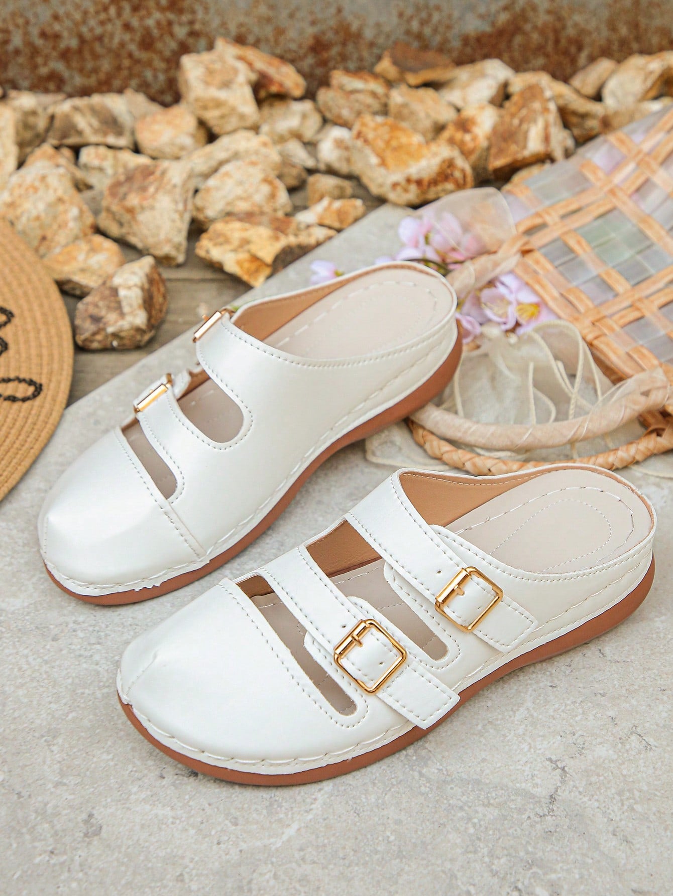 Women's bohemian wedge slide sandals with open toe, low wedge heel, slip-on design, and metal detail, available in plus sizes 36-43.