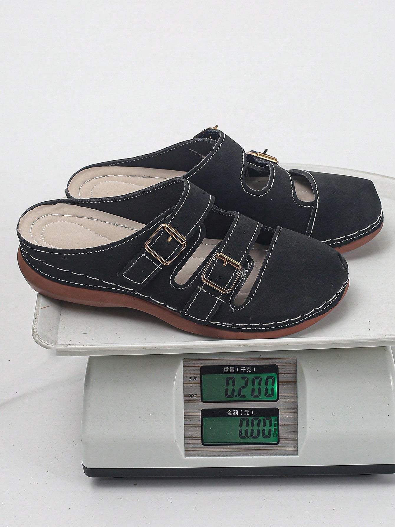 Women's bohemian wedge slide sandals with open toe, low wedge heel, slip-on design, and metal detail, available in plus sizes 36-43.