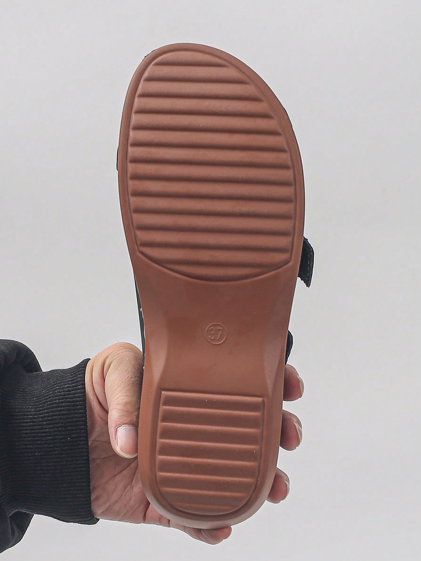 Women's bohemian wedge slide sandals with open toe, low wedge heel, slip-on design, and metal detail, available in plus sizes 36-43.