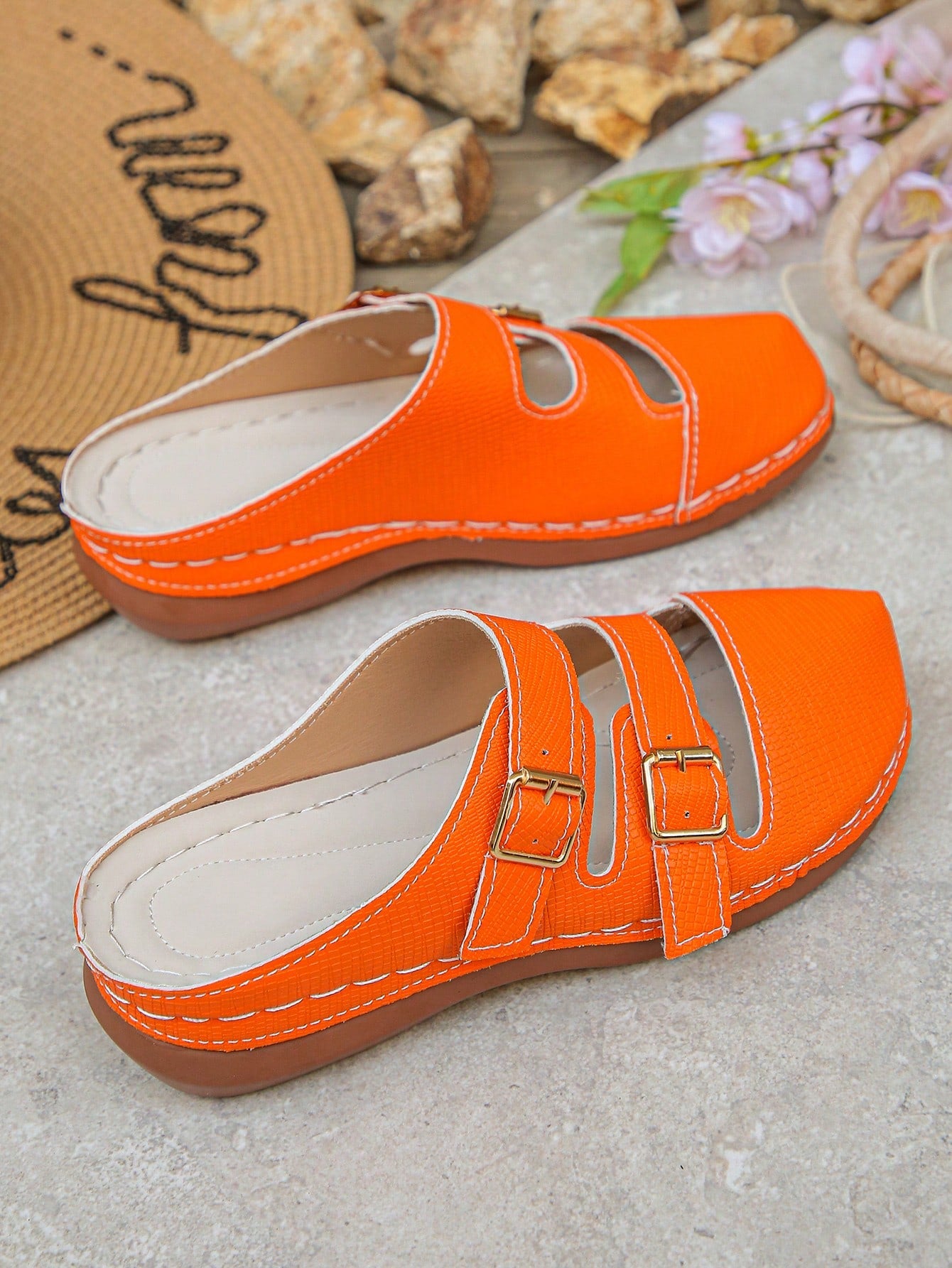 Women's bohemian wedge slide sandals with open toe, low wedge heel, slip-on design, and metal detail, available in plus sizes 36-43.