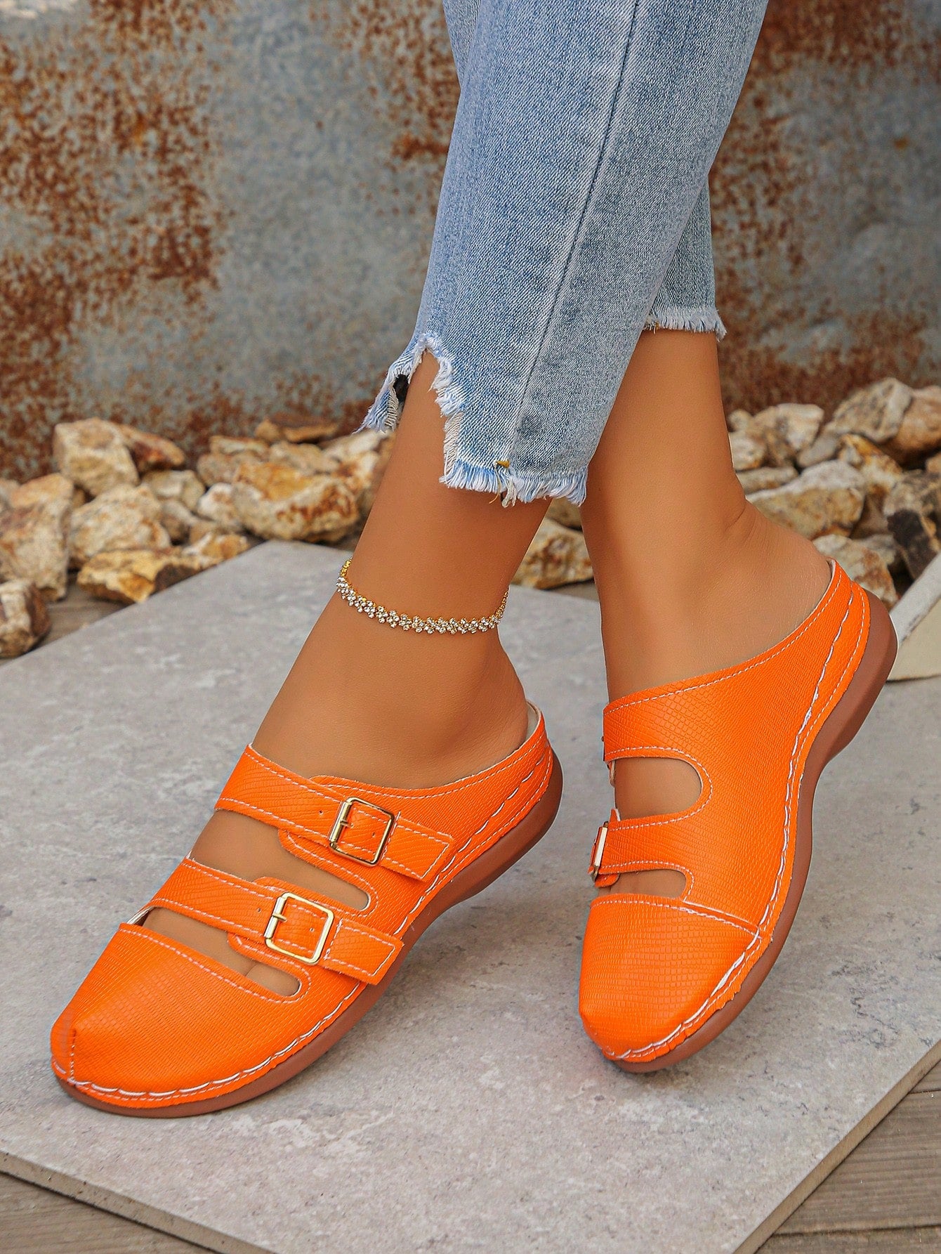 Women's bohemian wedge slide sandals with open toe, low wedge heel, slip-on design, and metal detail, available in plus sizes 36-43.