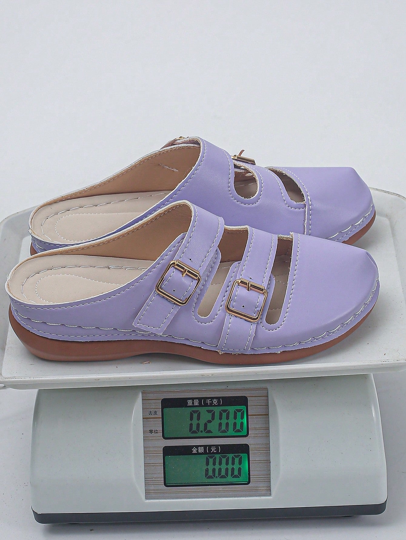 Women's bohemian wedge slide sandals with open toe, low wedge heel, slip-on design, and metal detail, available in plus sizes 36-43.