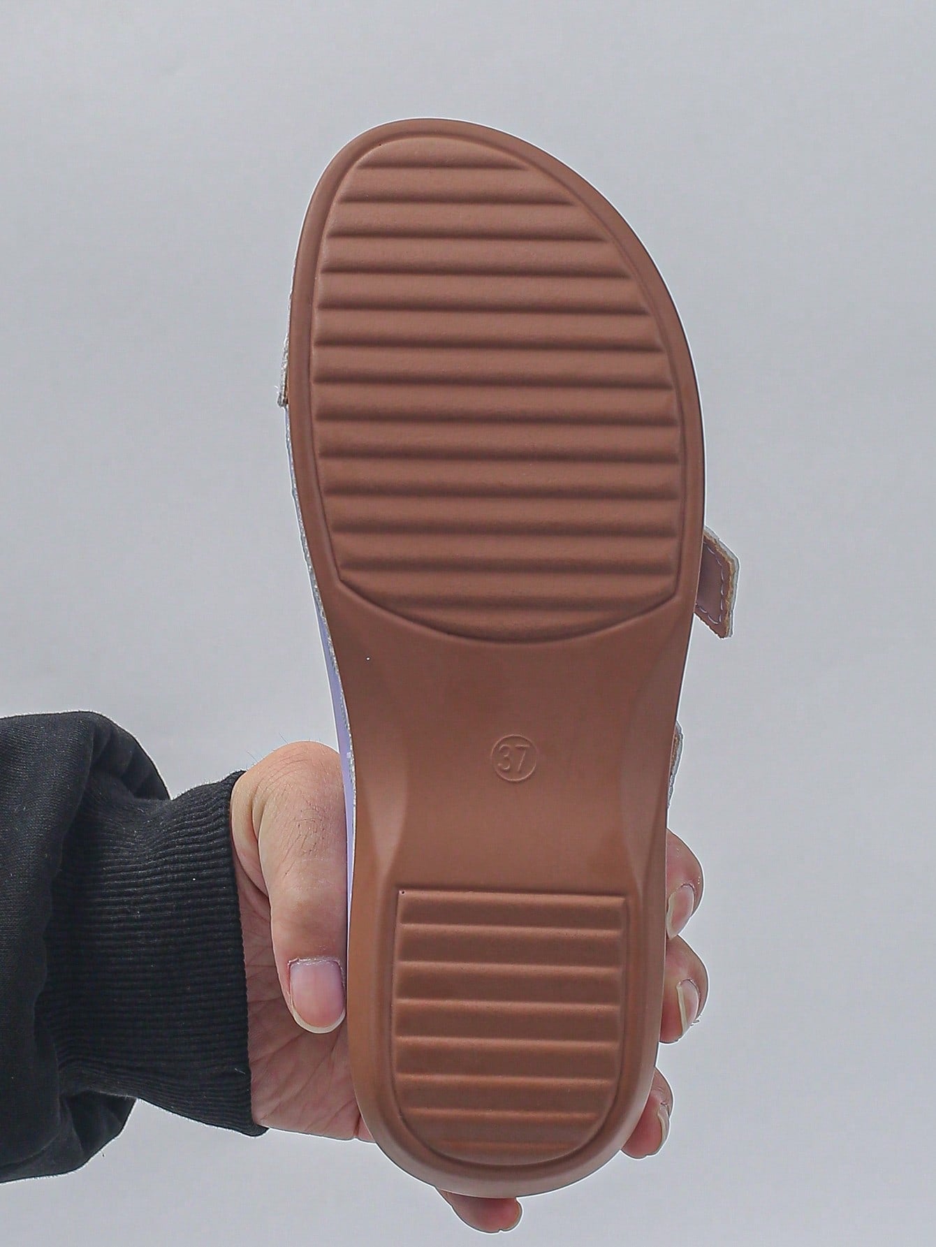 Women's bohemian wedge slide sandals with open toe, low wedge heel, slip-on design, and metal detail, available in plus sizes 36-43.