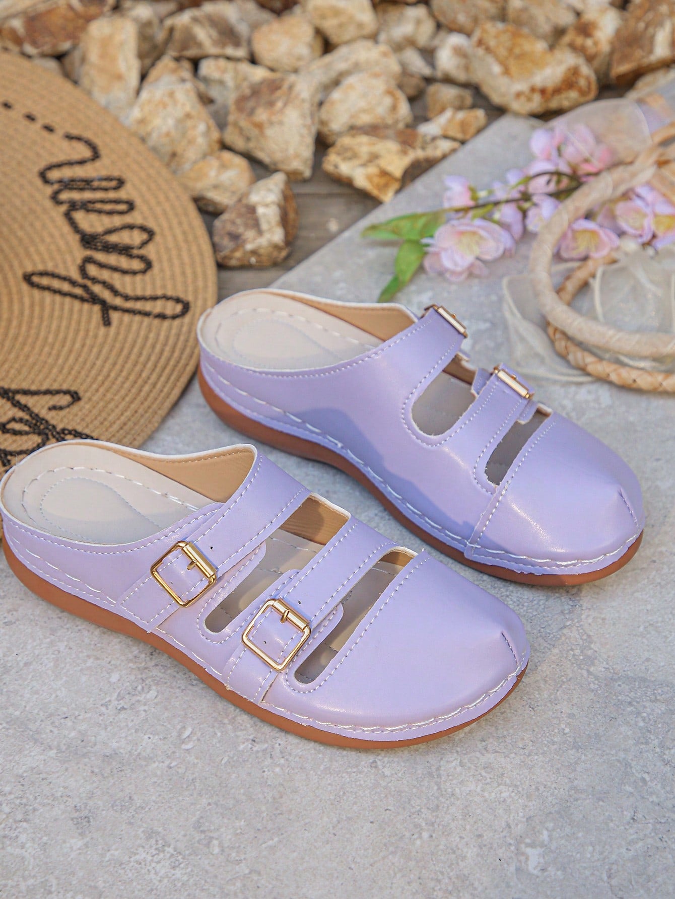 Women's bohemian wedge slide sandals with open toe, low wedge heel, slip-on design, and metal detail, available in plus sizes 36-43.