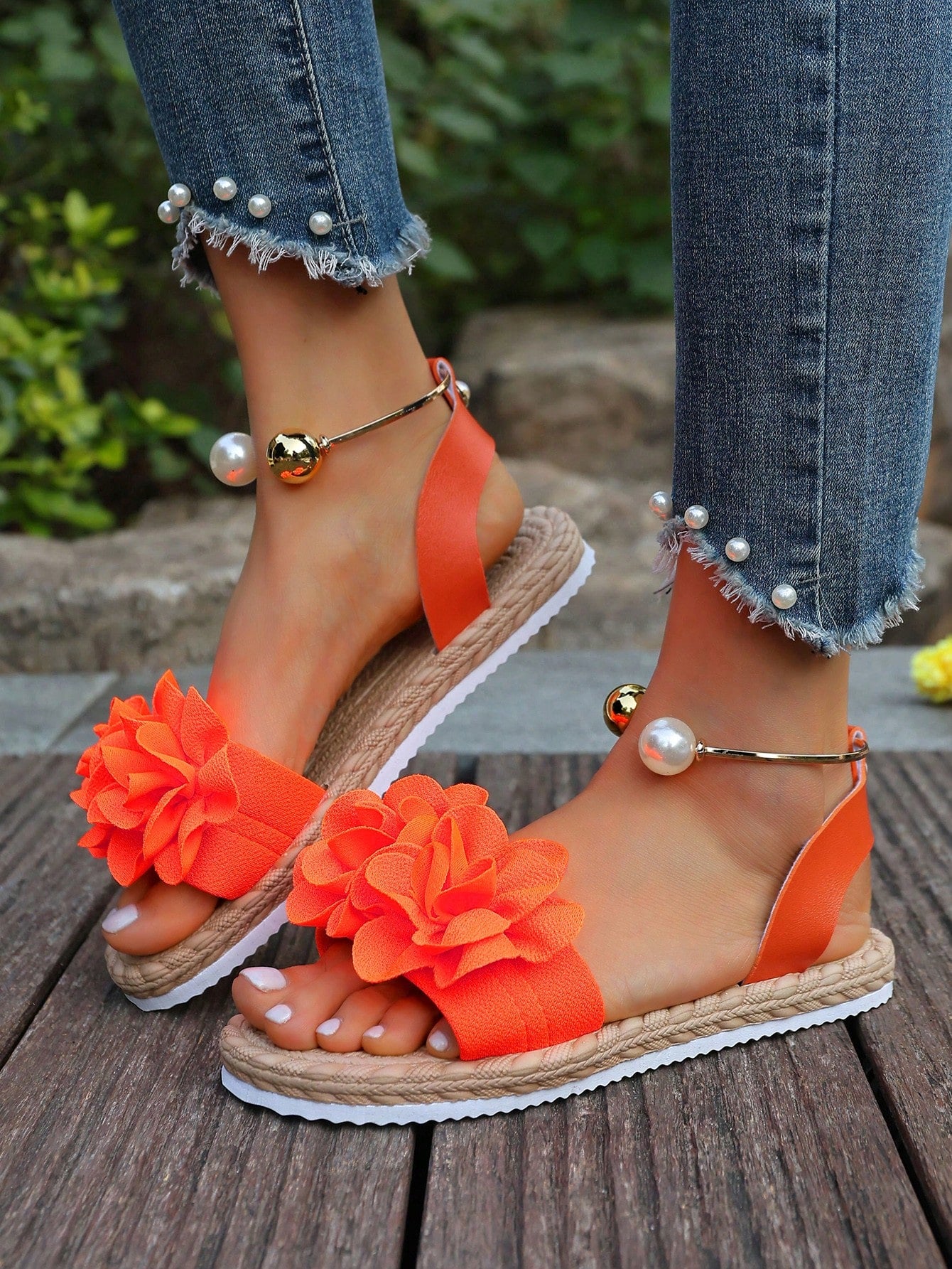 Women's floral beach slip-on flat sandals with soft non-slip sole and classic open sandal design in beige.