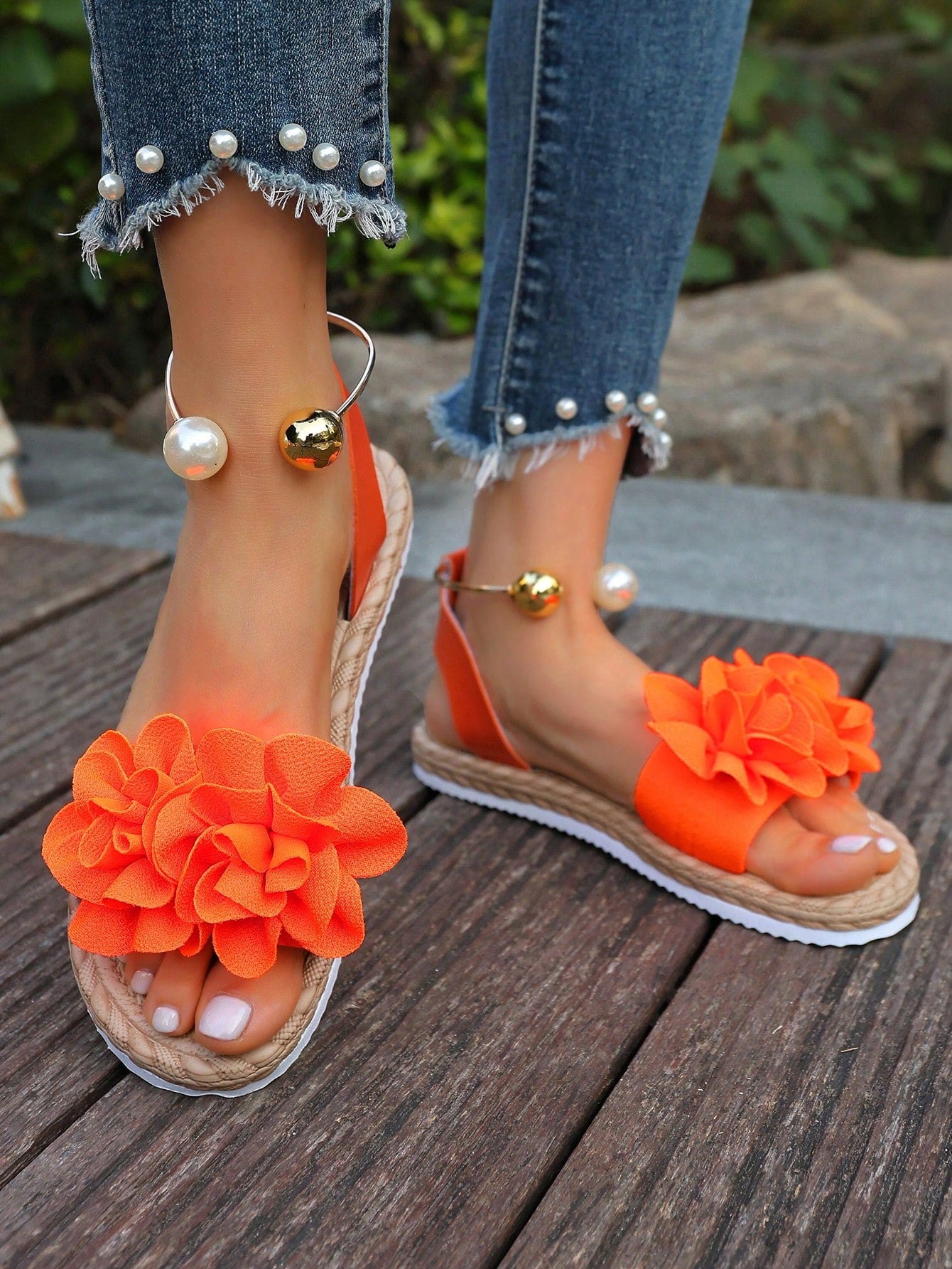 Women's floral beach slip-on flat sandals with soft non-slip sole and classic open sandal design in beige.