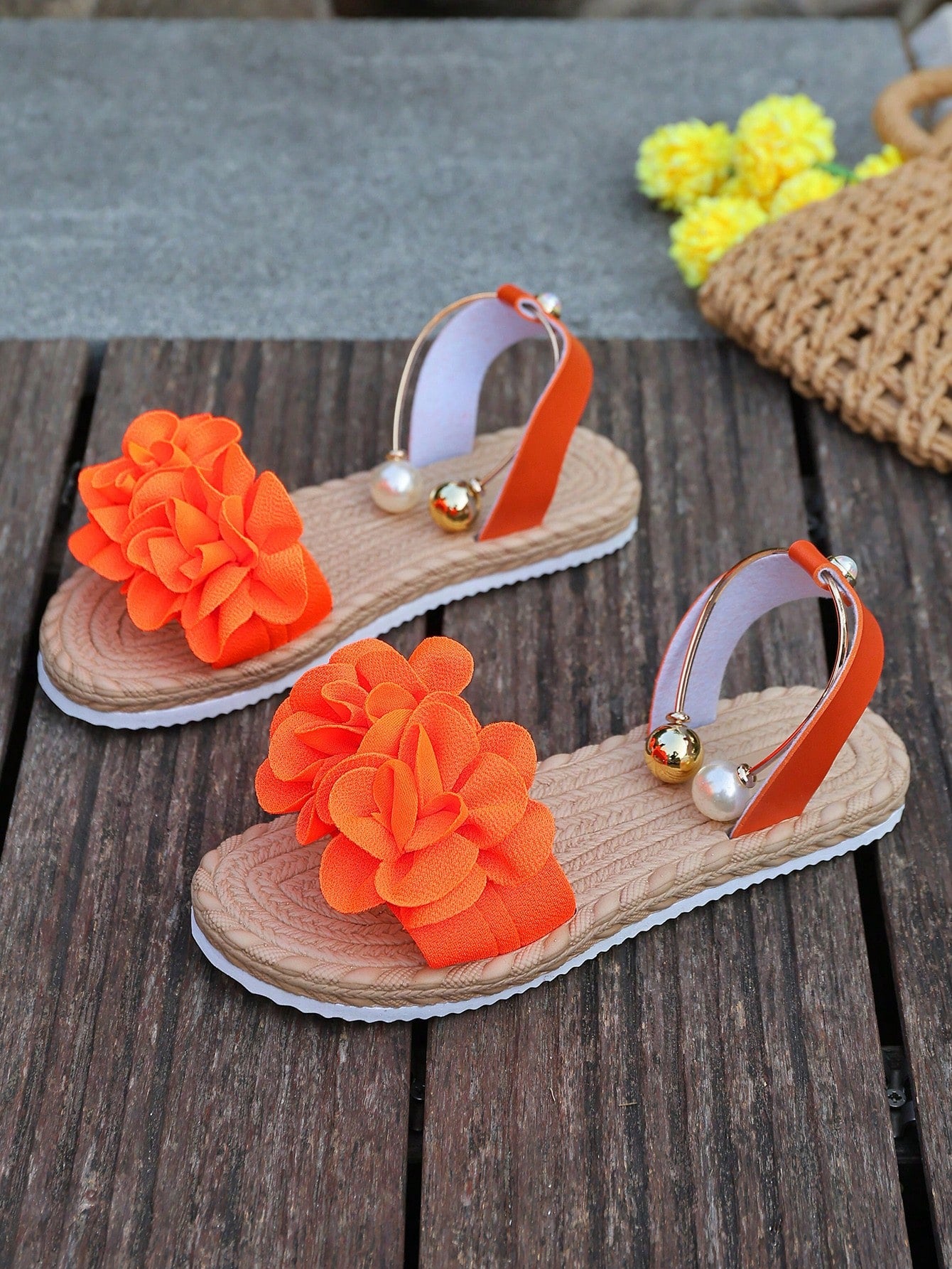 Women's floral beach slip-on flat sandals with soft non-slip sole and classic open sandal design in beige.