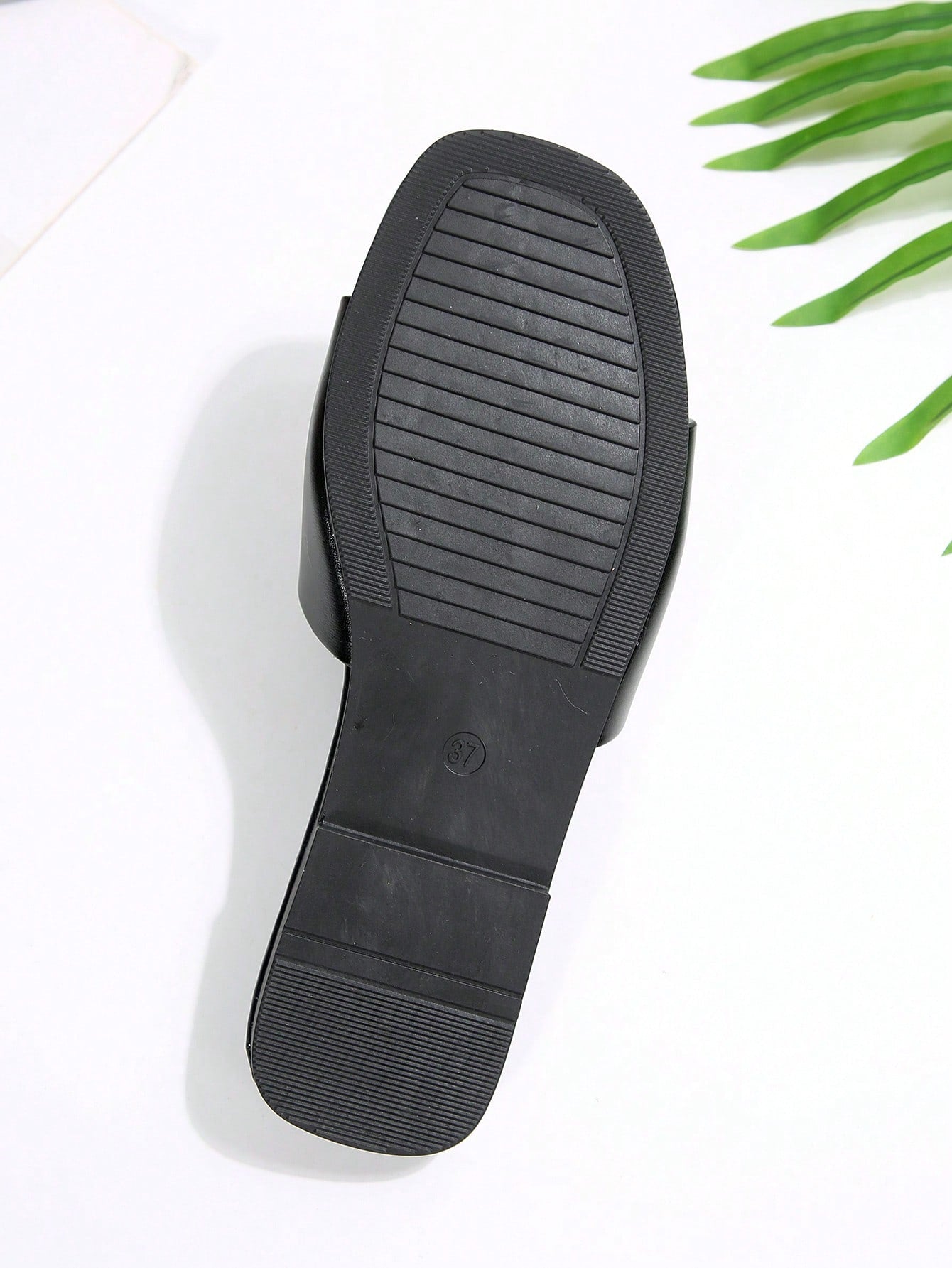 Women's gold-tone slip-on slide sandals with open toe and chain link detailing, shown as casual flat sandals for indoor and outdoor use.